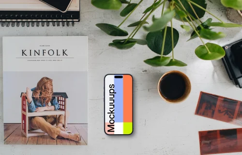 Top view of office desk with a phone mockup