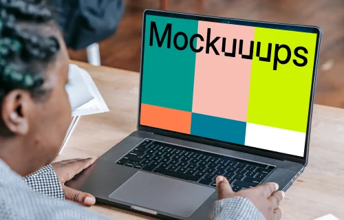 Woman using a MacBook Pro mockup