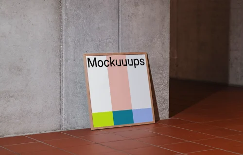 Wooden frame mockup leaning against a concrete wall