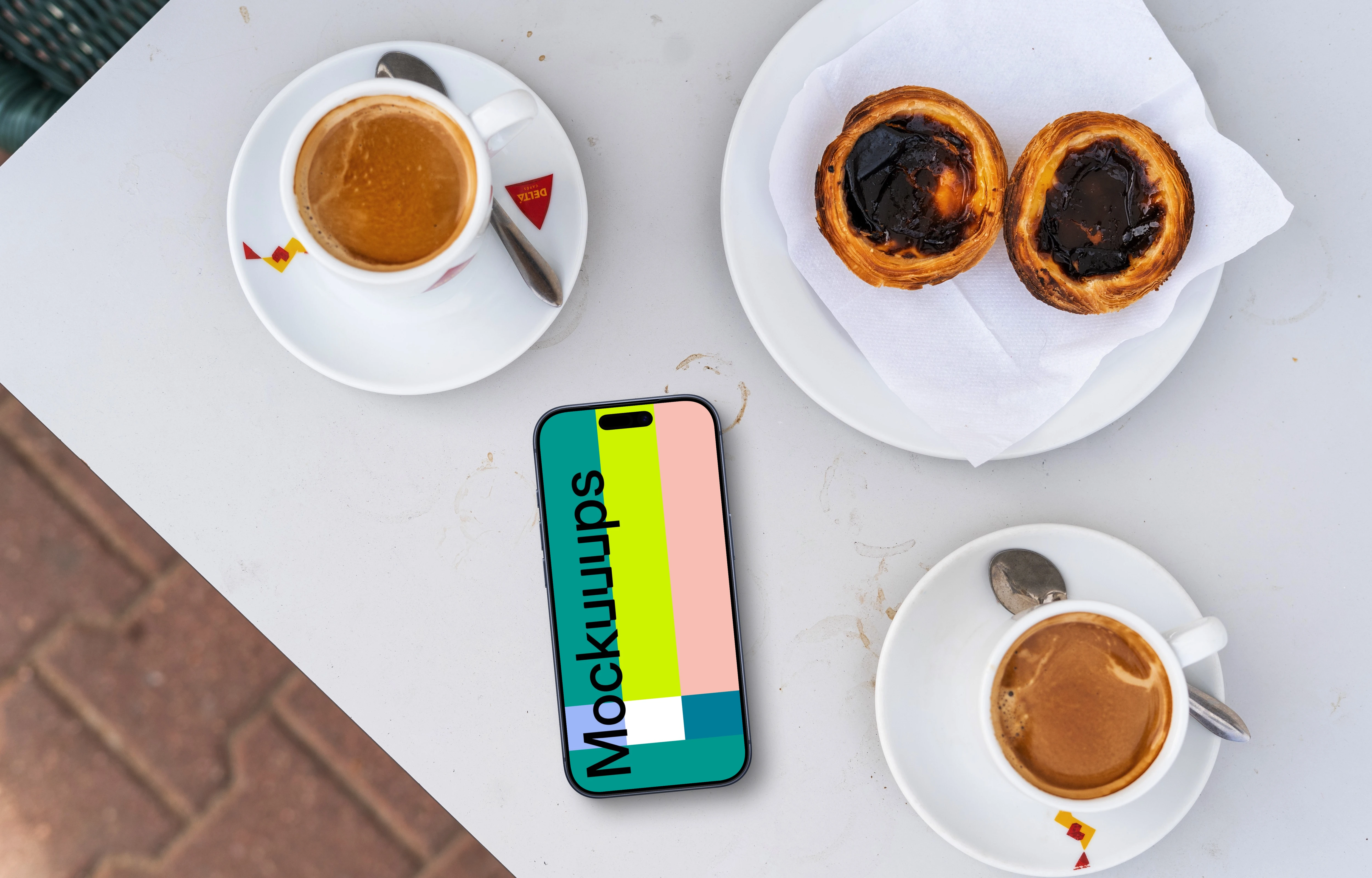 A smartphone mockup with coffees and snacks