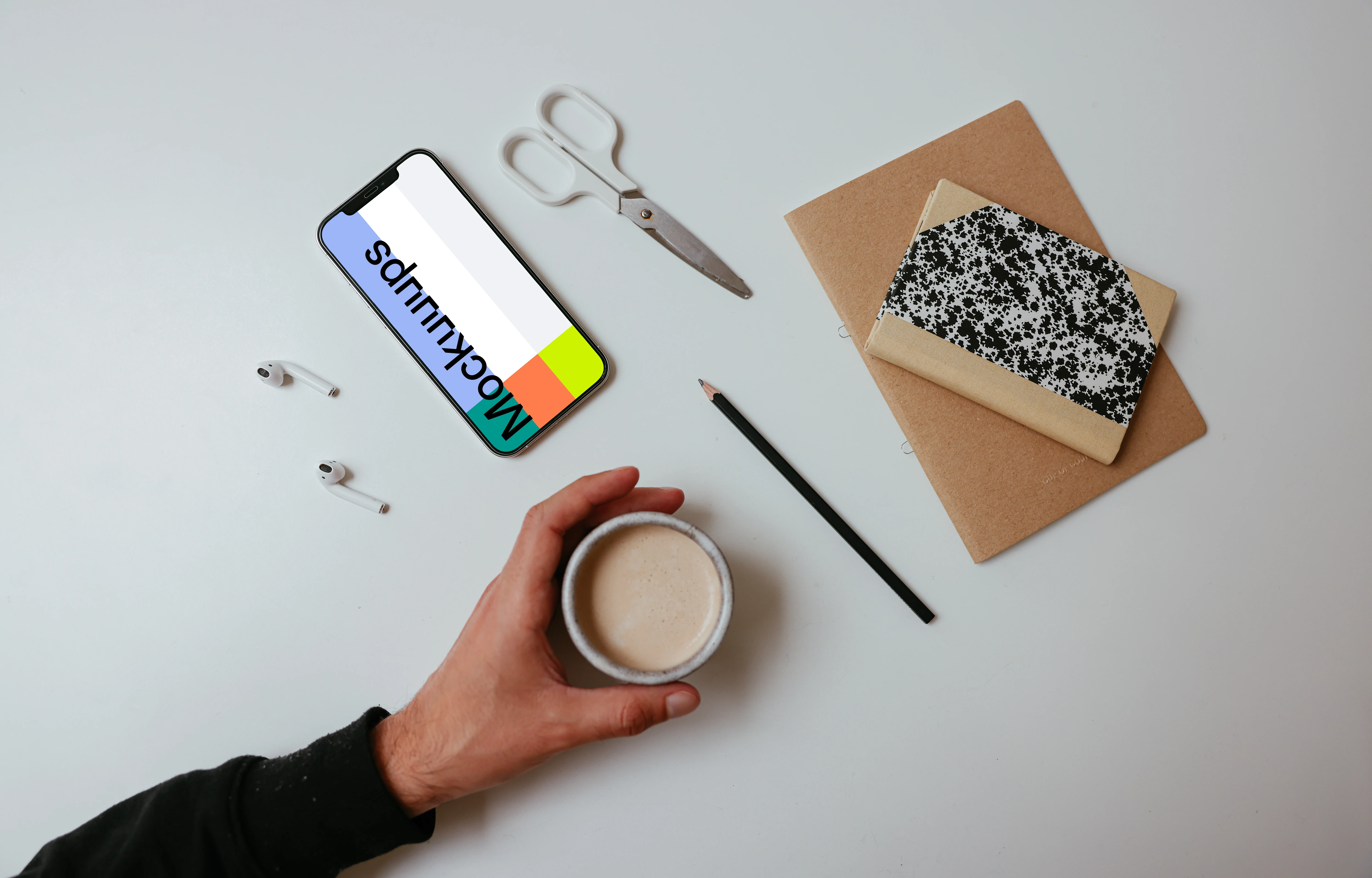 Cup of coffee with iPhone Mockup