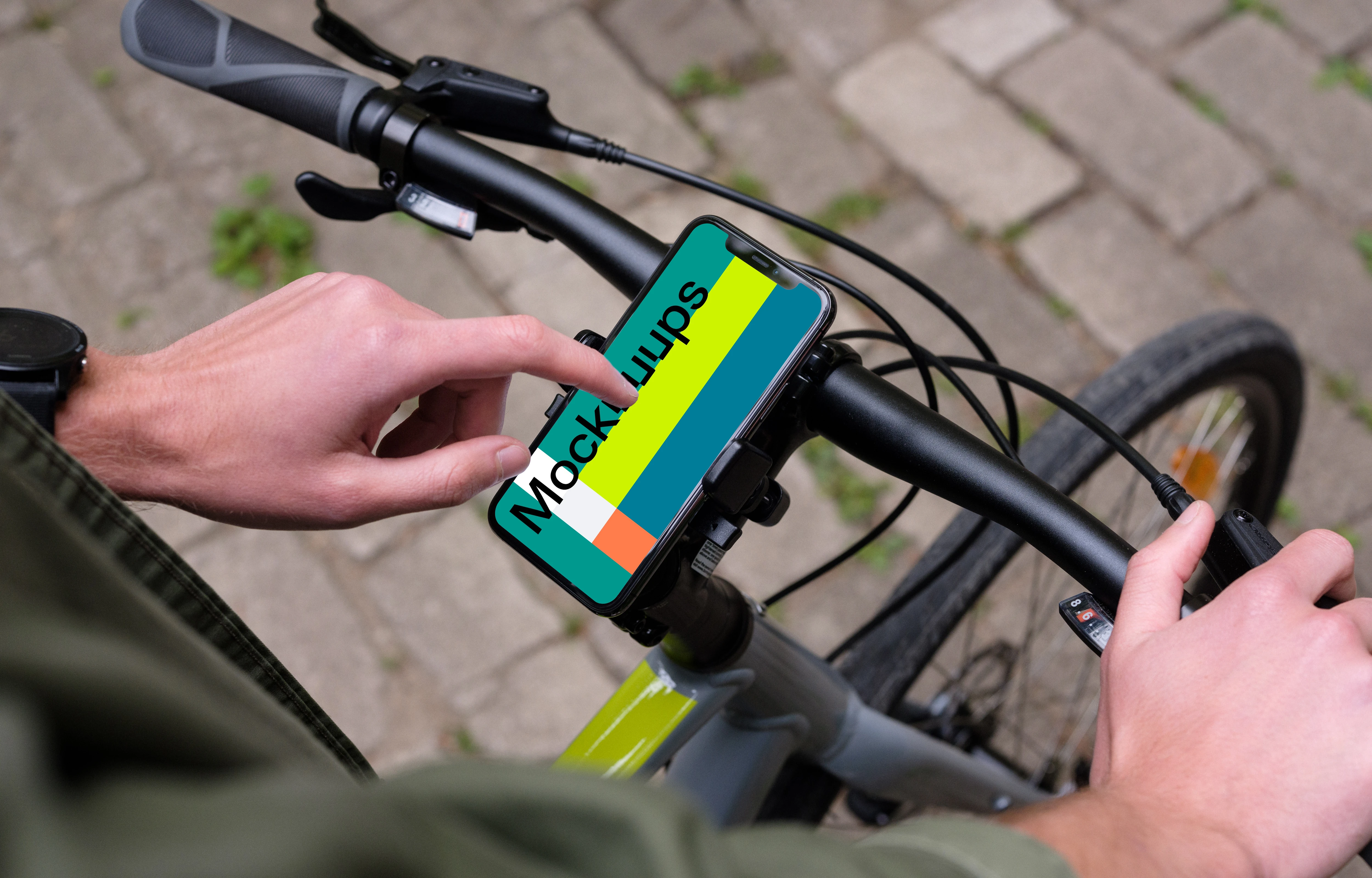 Tapping on iPhone 11 Pro mockup mounted on a bike