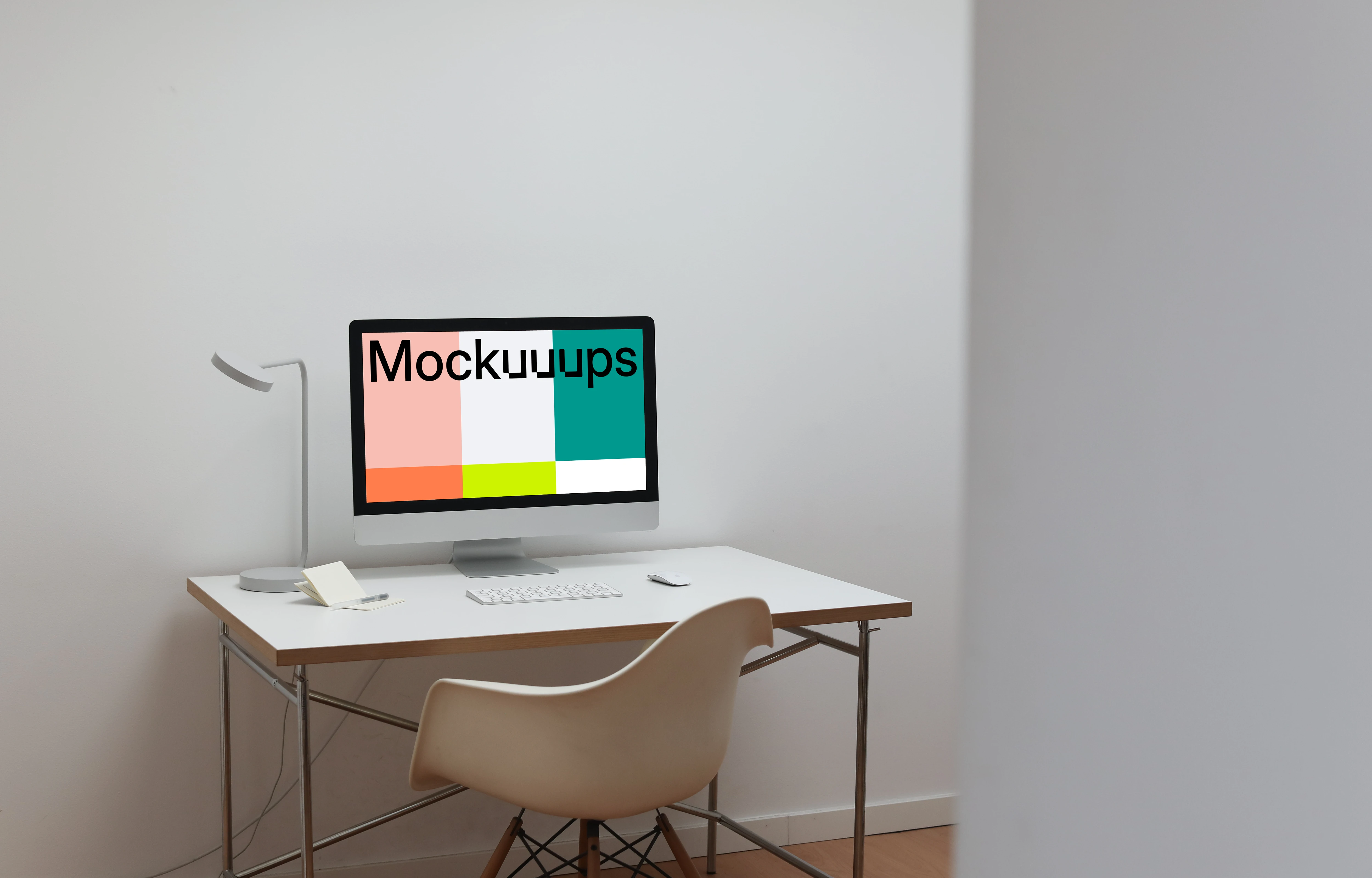 iMac mockup in a simple workspace 
