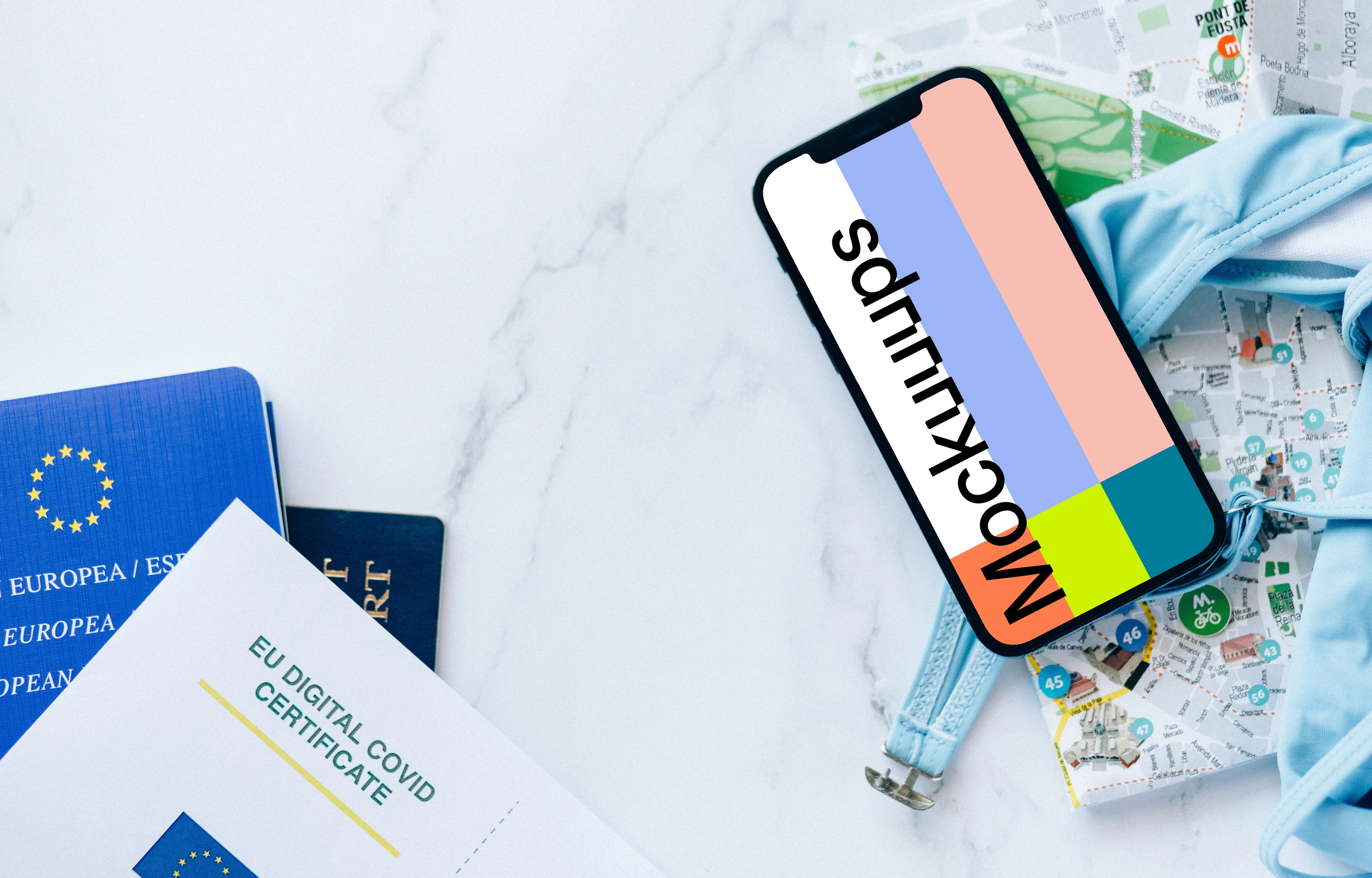 iPhone 12 Pro mockup placed on European travel documents