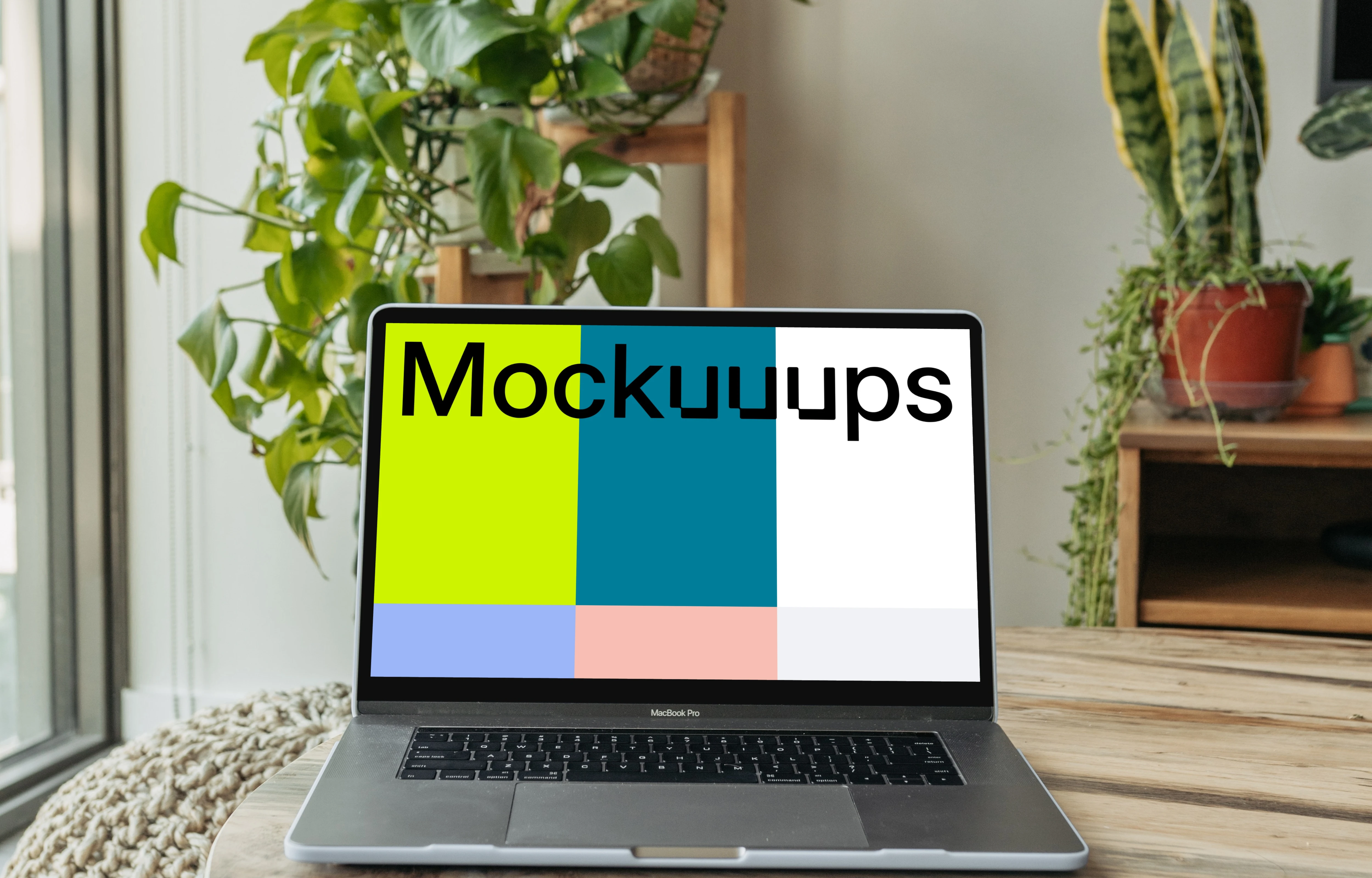 MacBook Pro mockup on a wooden table