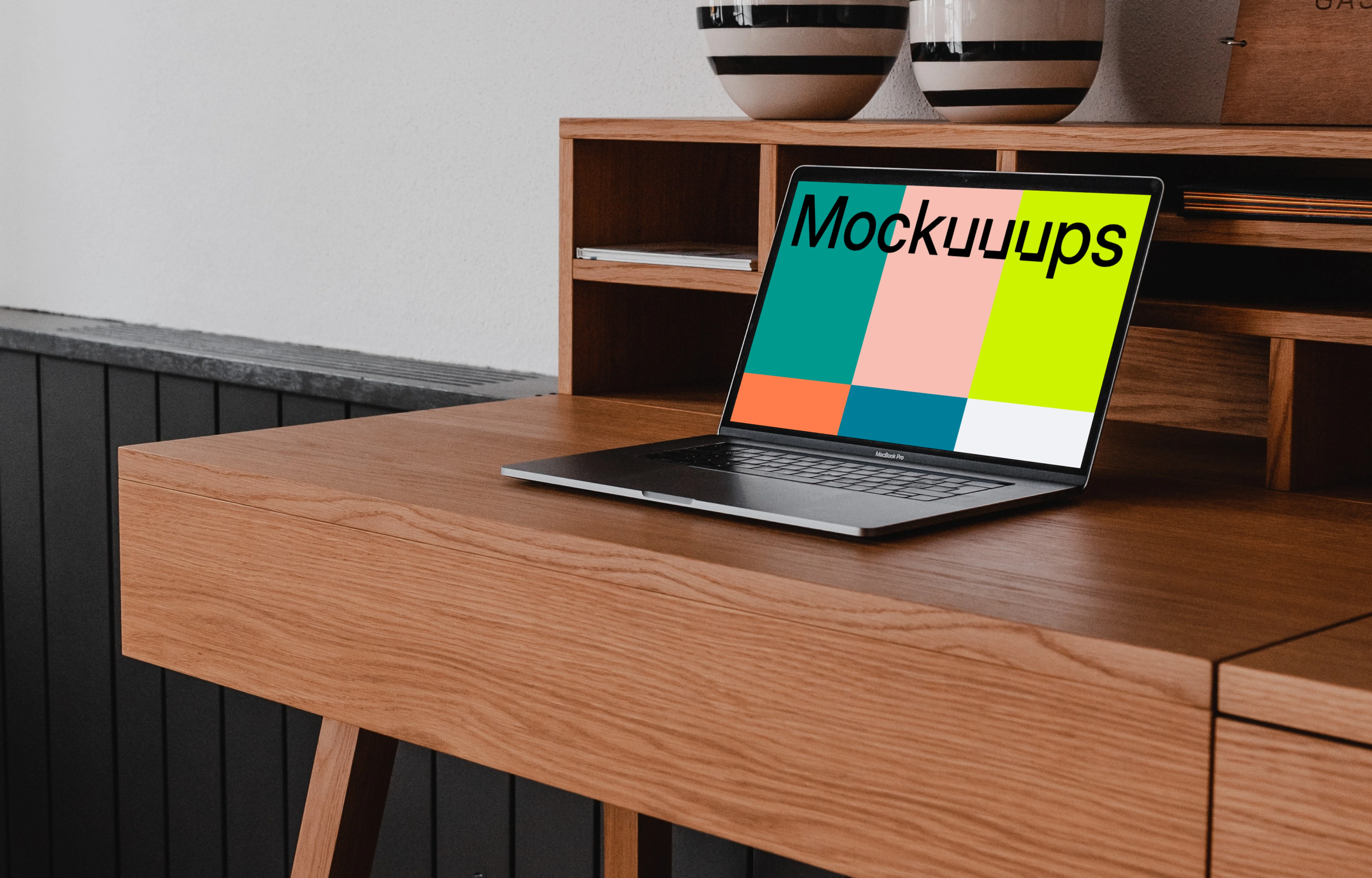 MacBook Pro mockup (zoom out) on a table