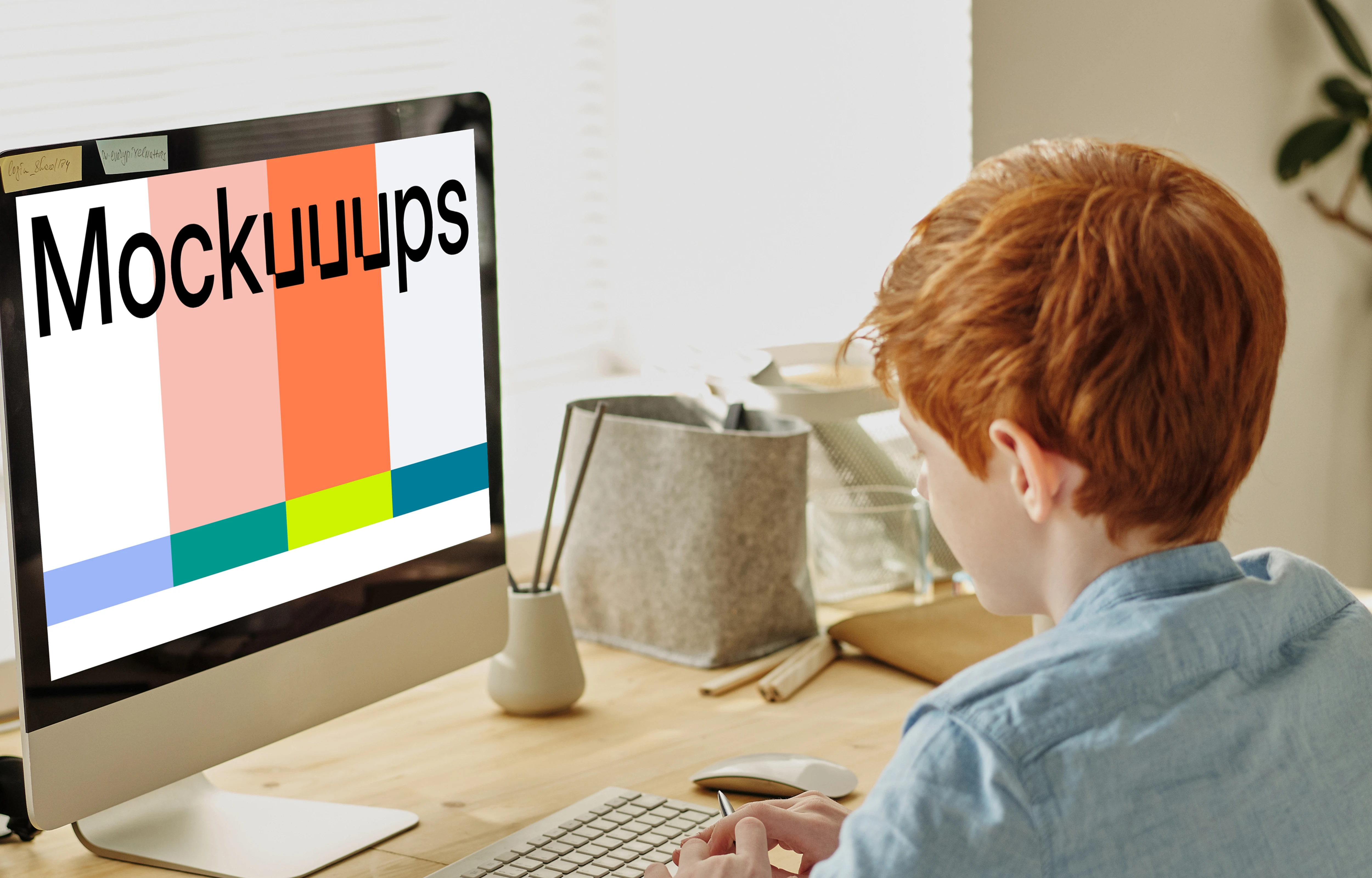 Mockup of red-haired child studying on an iMac