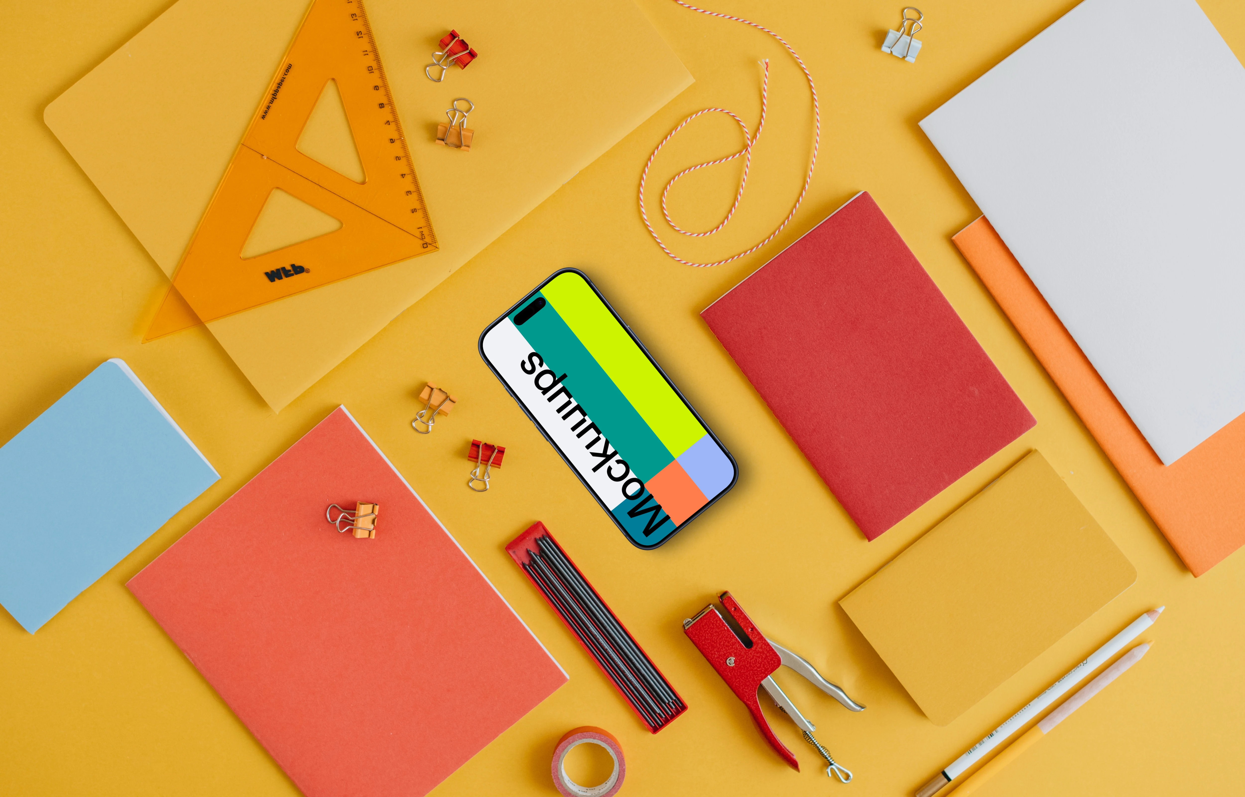 Phone mockup with back to school elements around