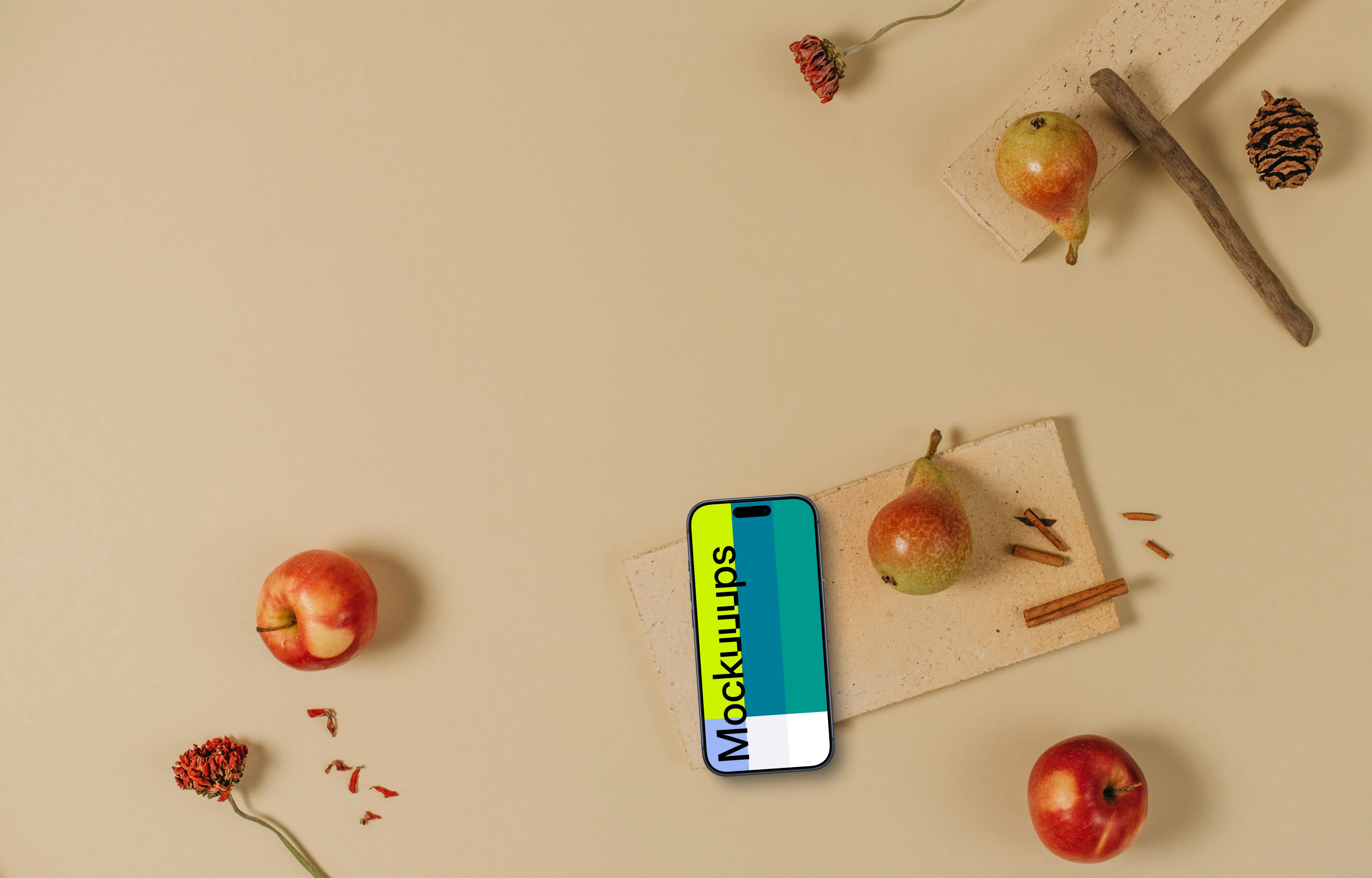 Top view of phone mockup with apples around