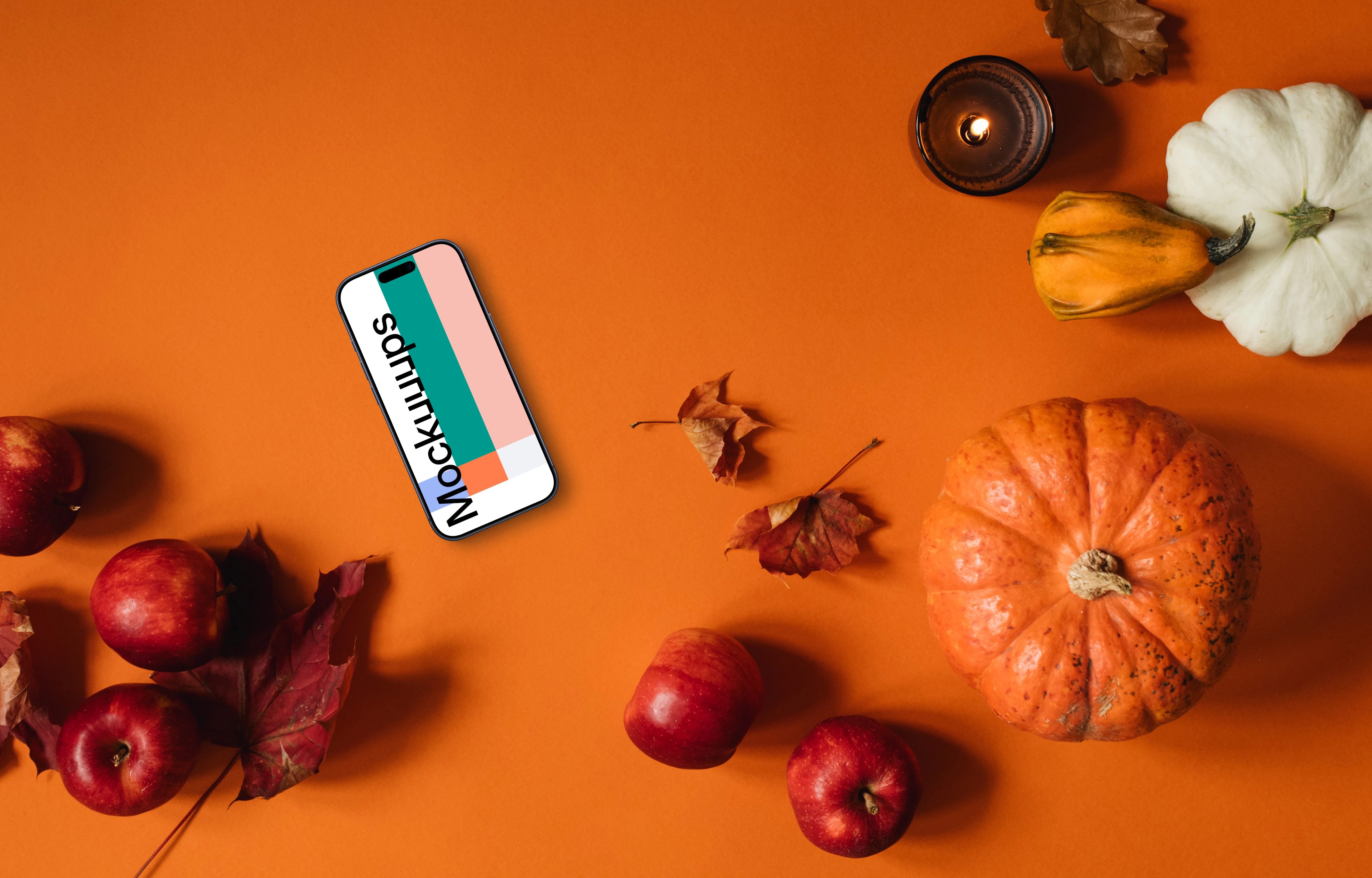 Top view of smartphone mockup with halloween decorations