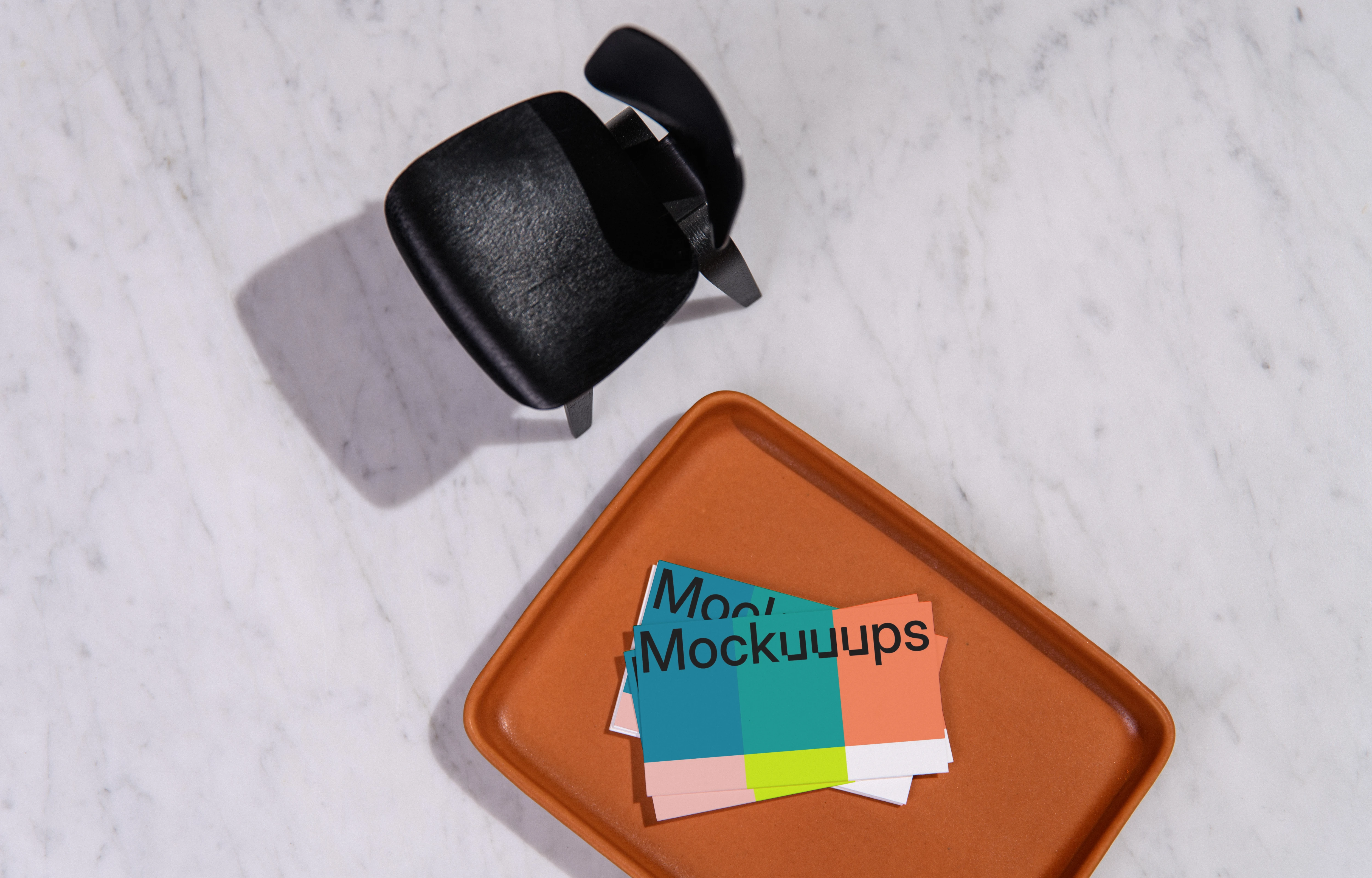 Business card mockup on a marble surface