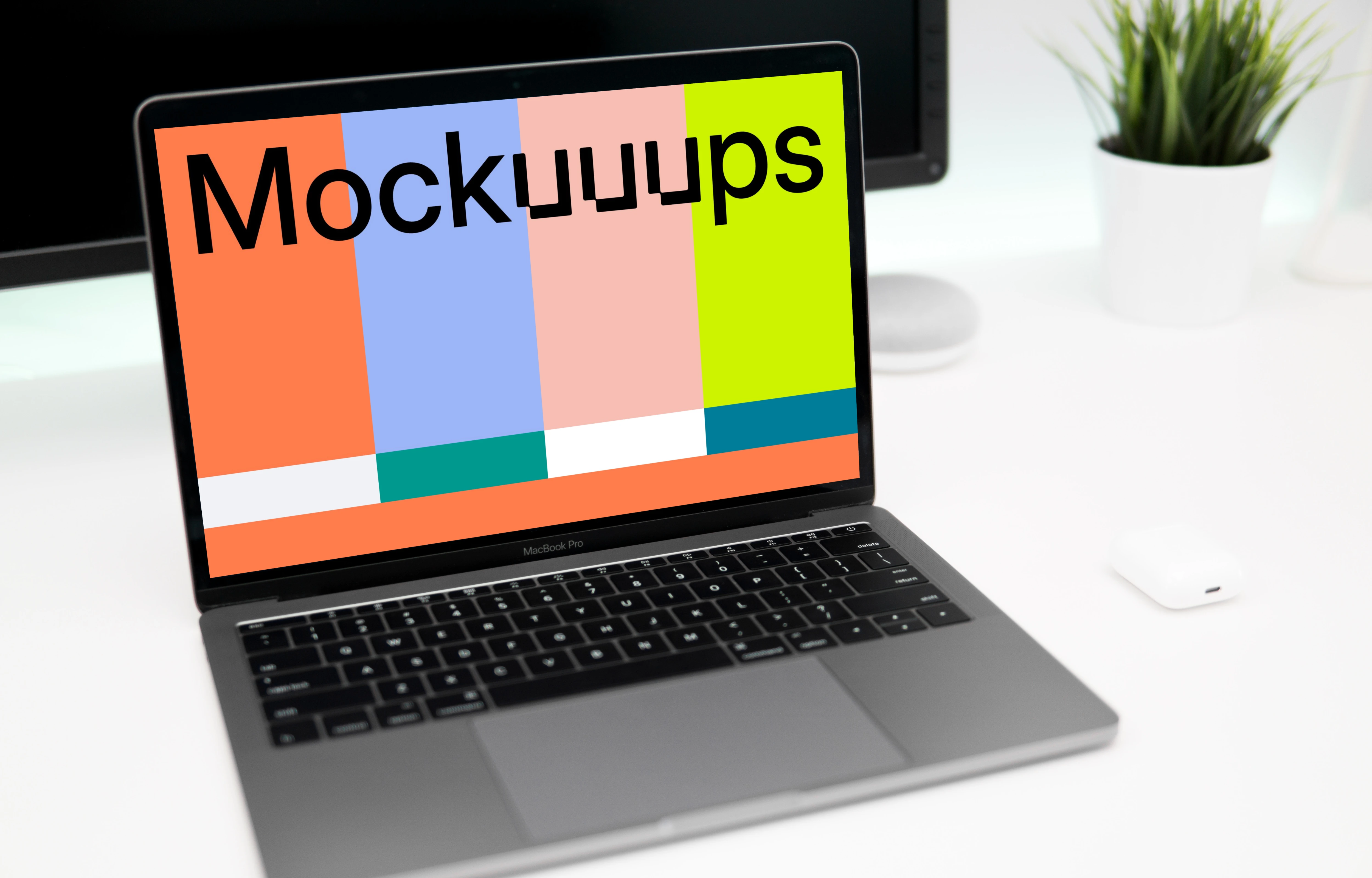 Close view of Macbook Pro mockup on white desk