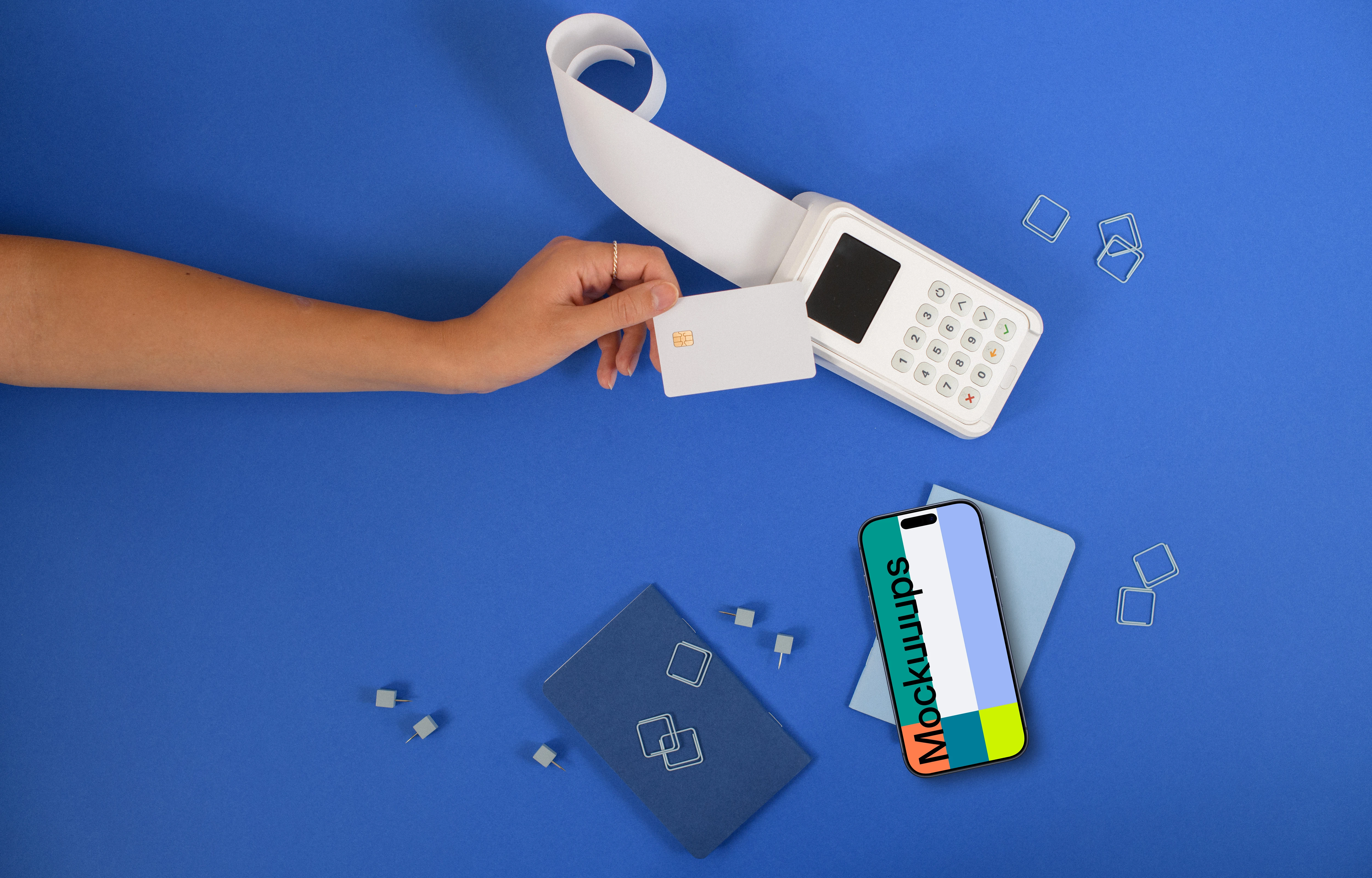 Contactless payment and an iPhone mockup on blue background