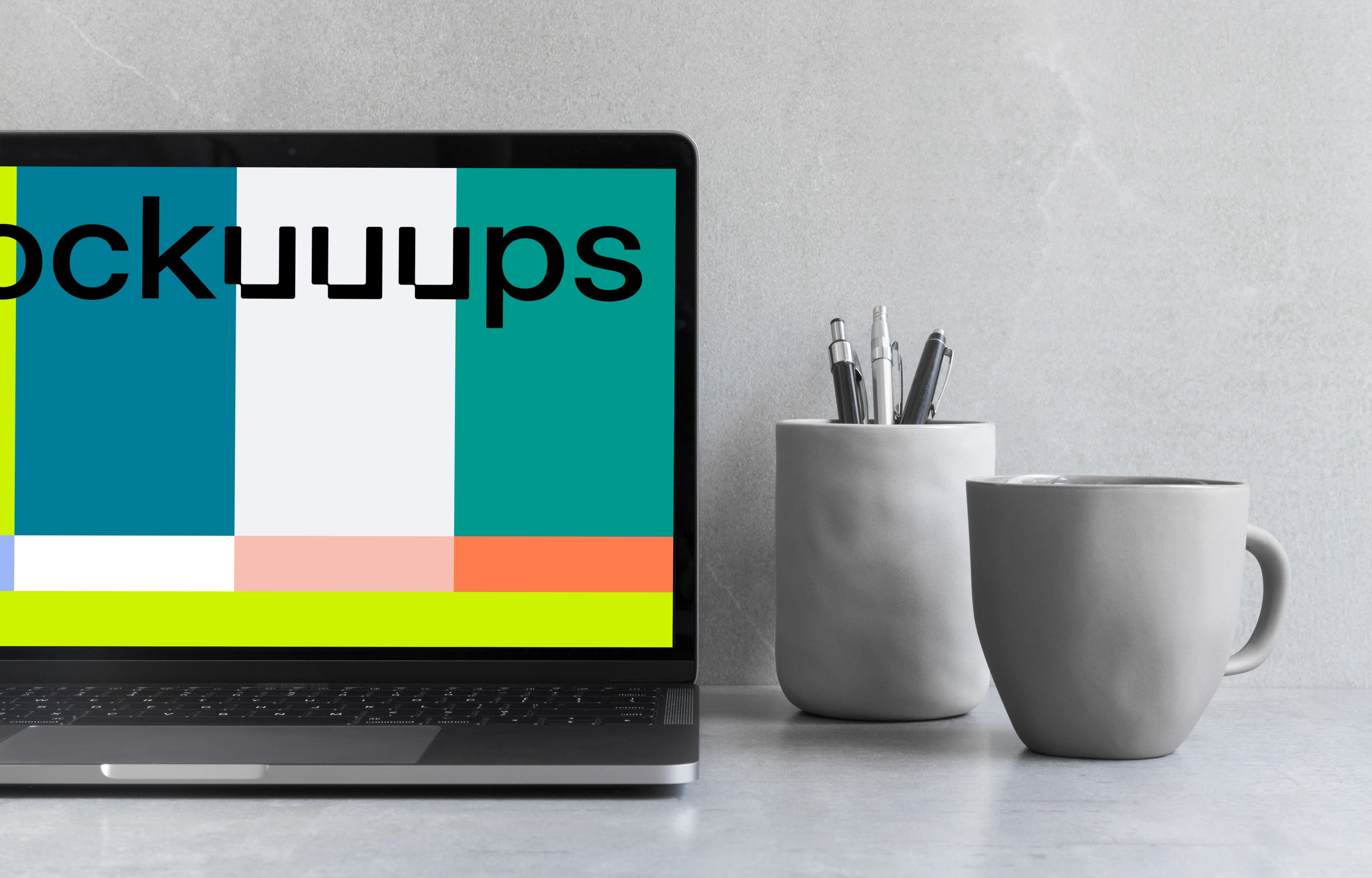 Cropped view of Macbook Pro mockup on the gray table