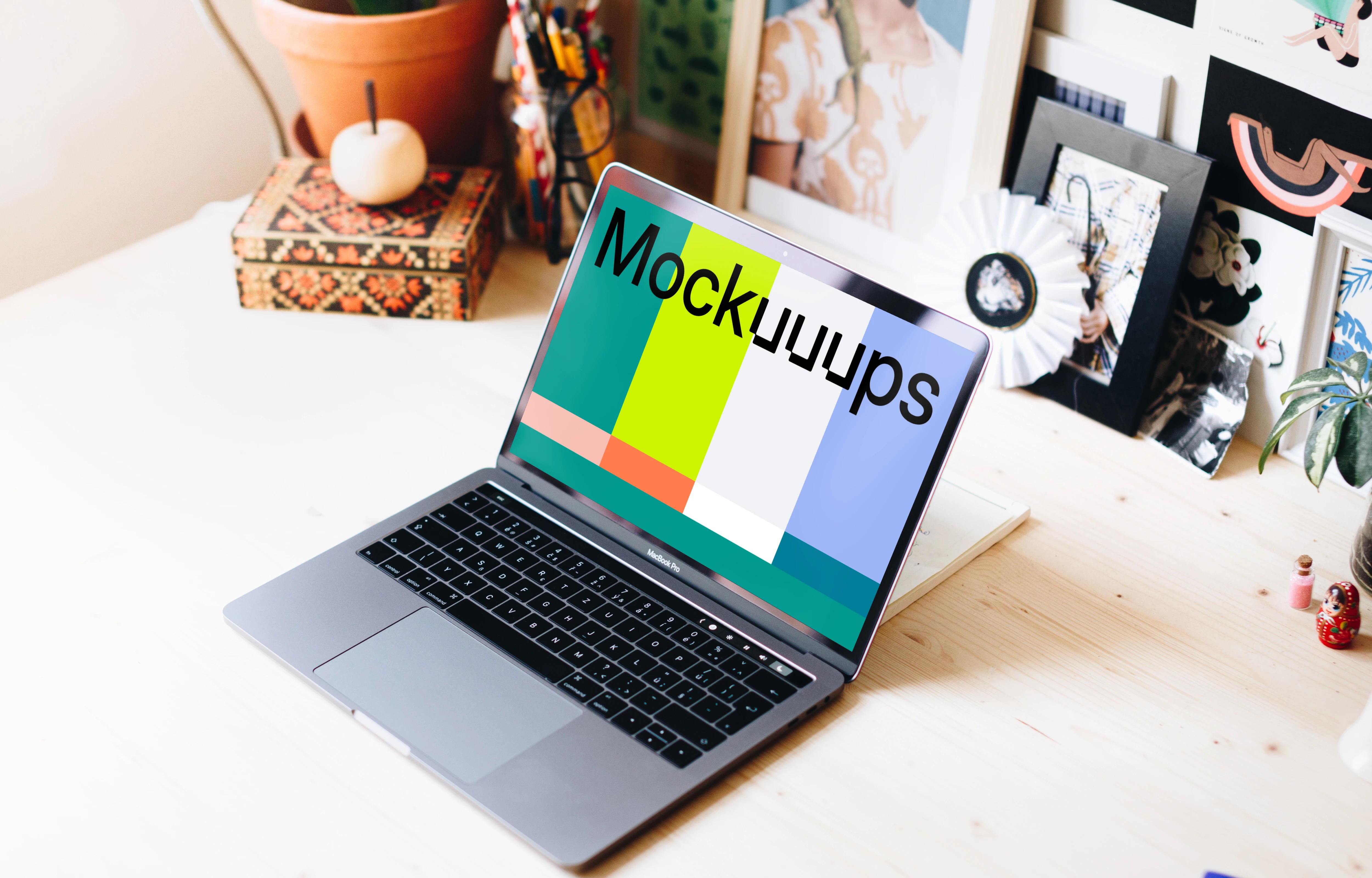 Creative workplace with Macbook Pro mockup