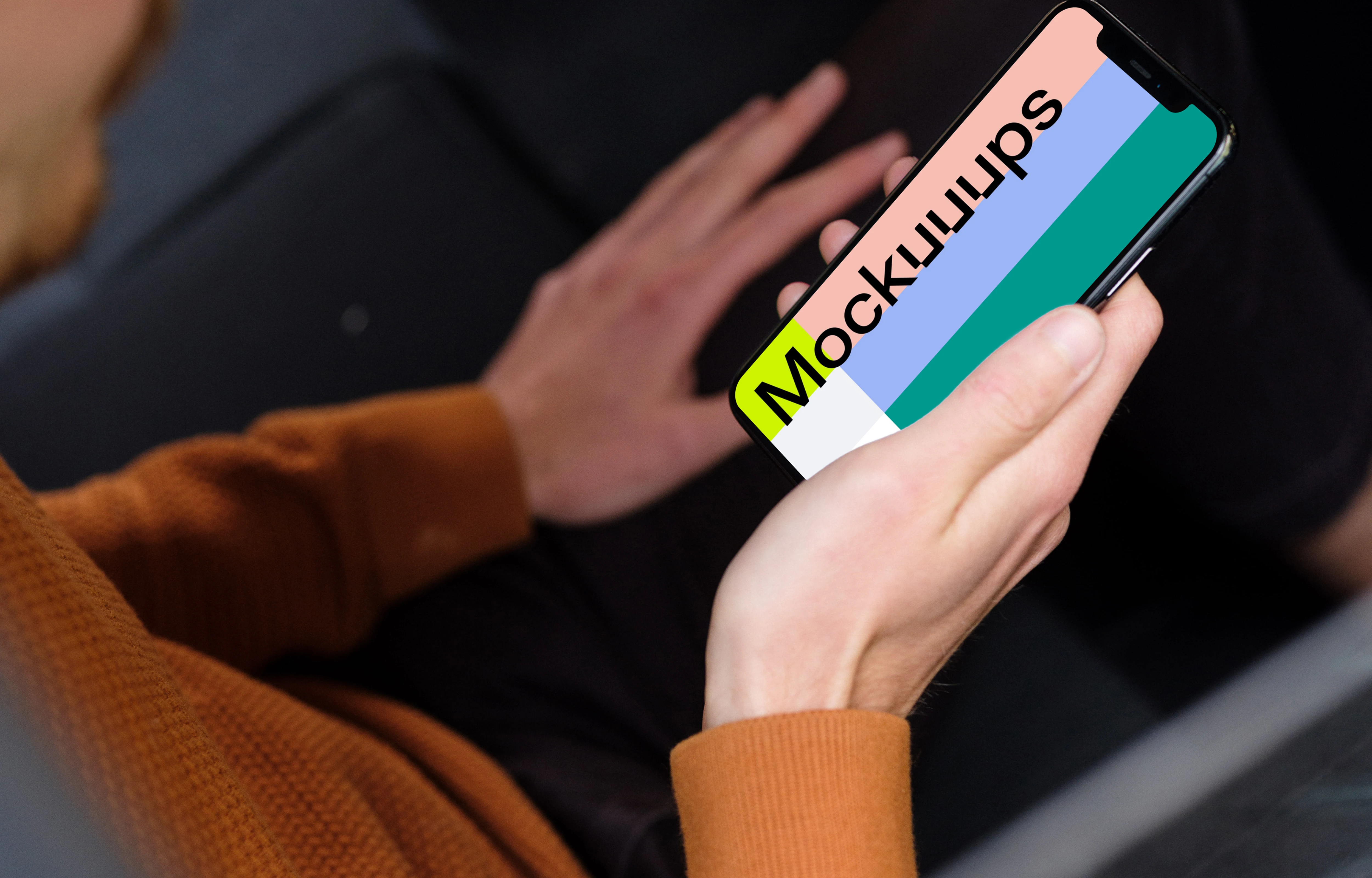 Over the shoulder view of passenger viewing iPhone 11 mockup