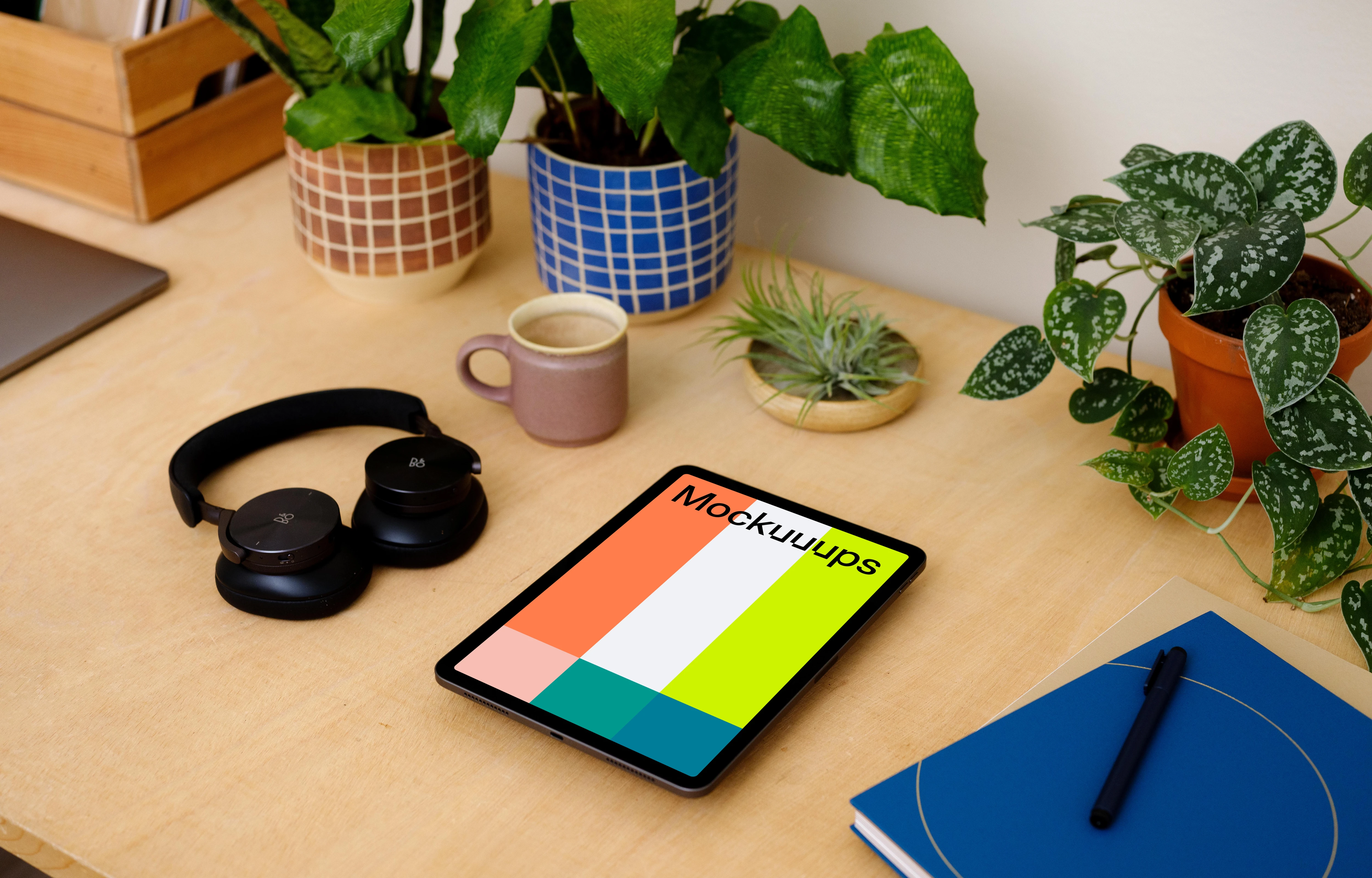 iPad Air mockup with a coffee mug at the side