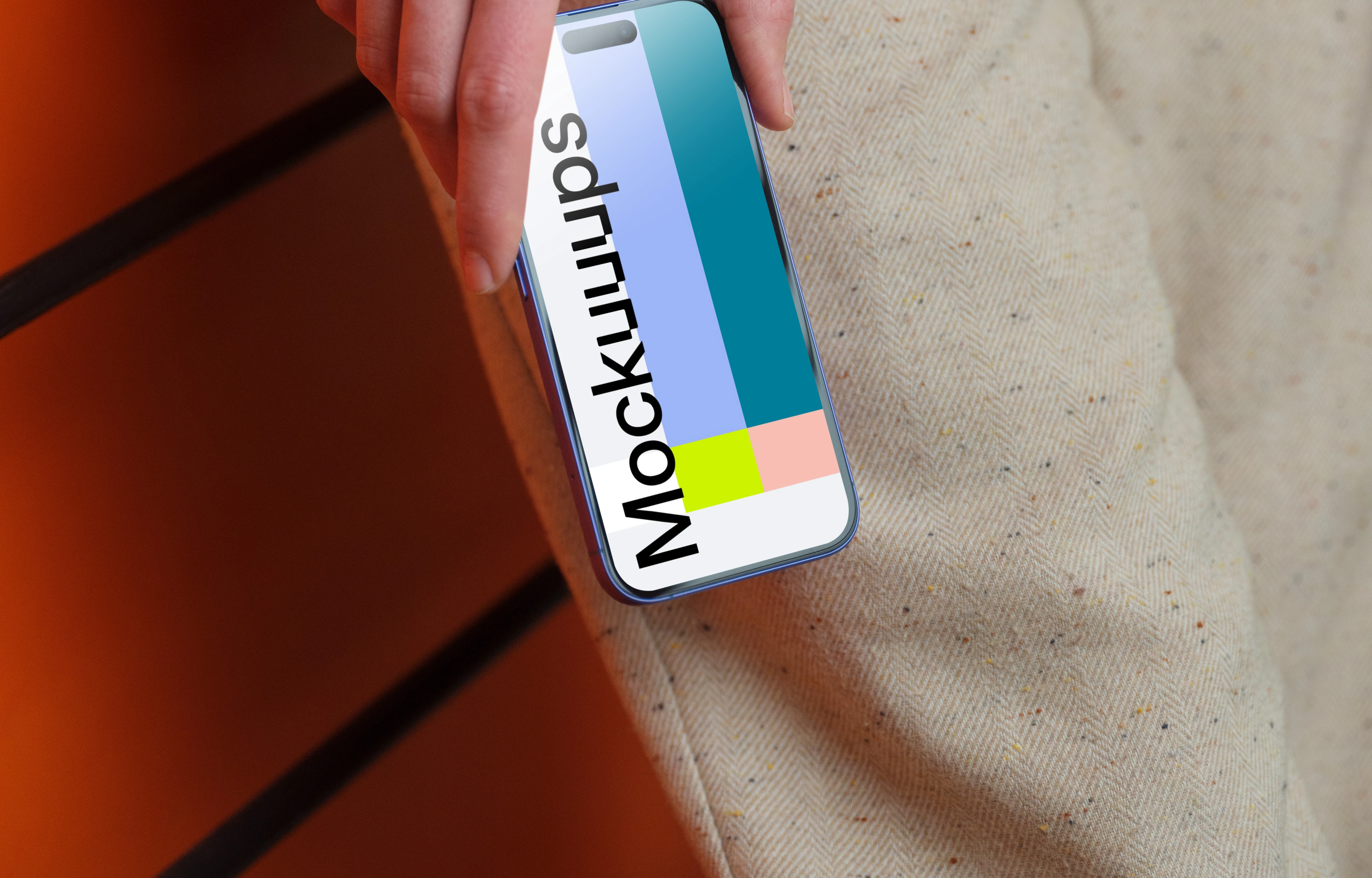 iPhone 16 mockup in a casual setting