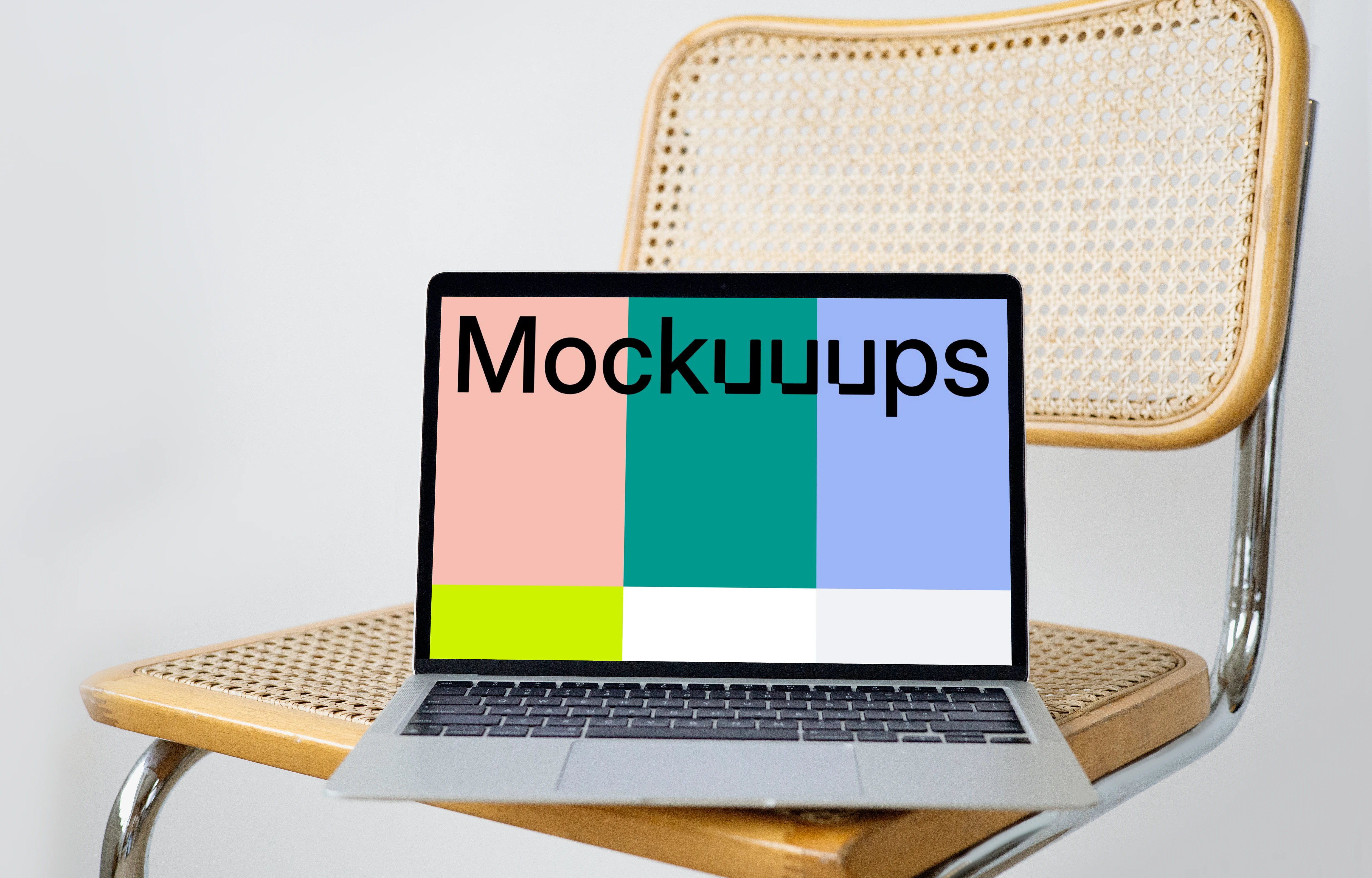MacBook mockup on a chair 