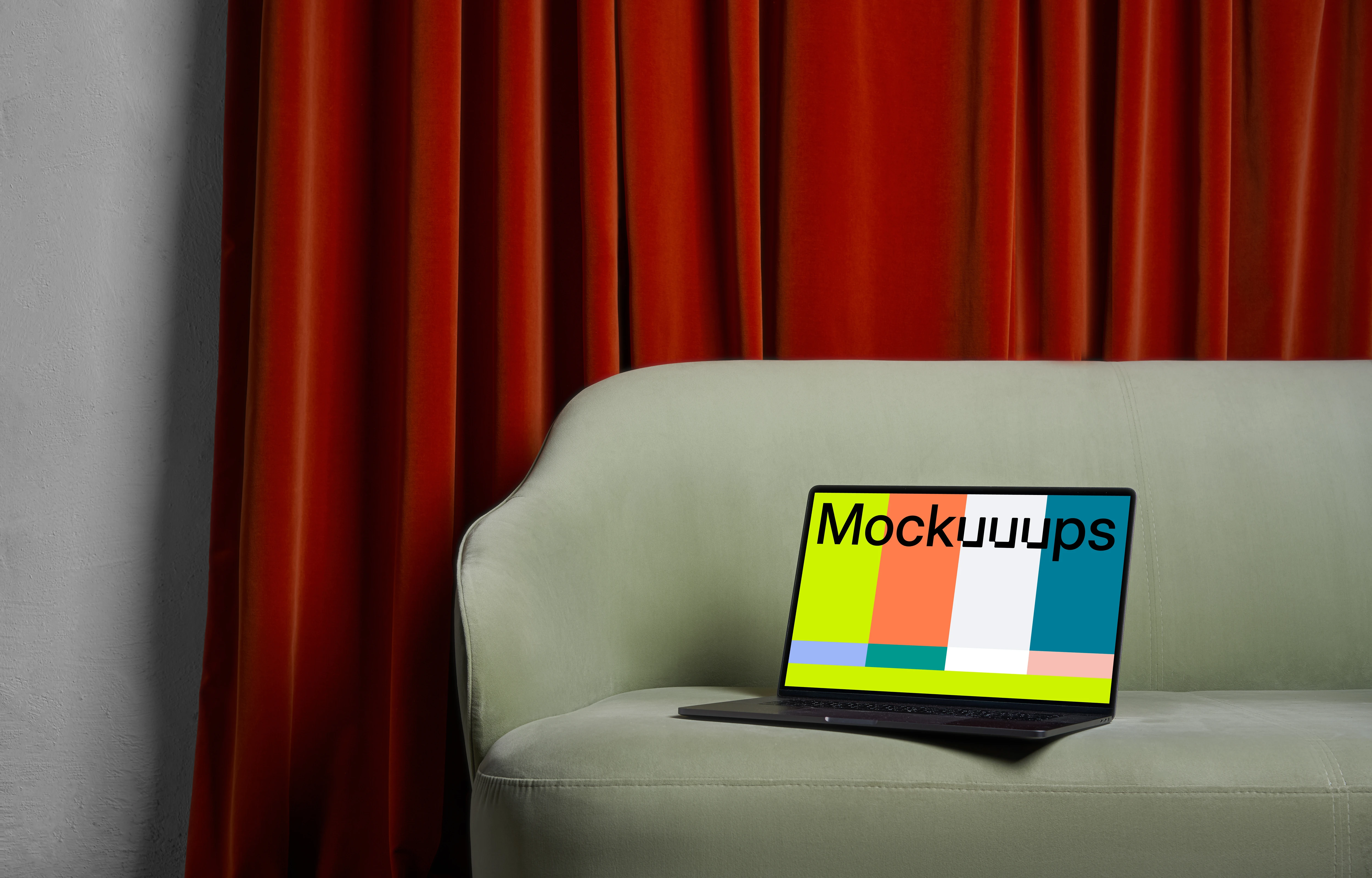 MacBook mockup on a couch with a brown curtain in the background