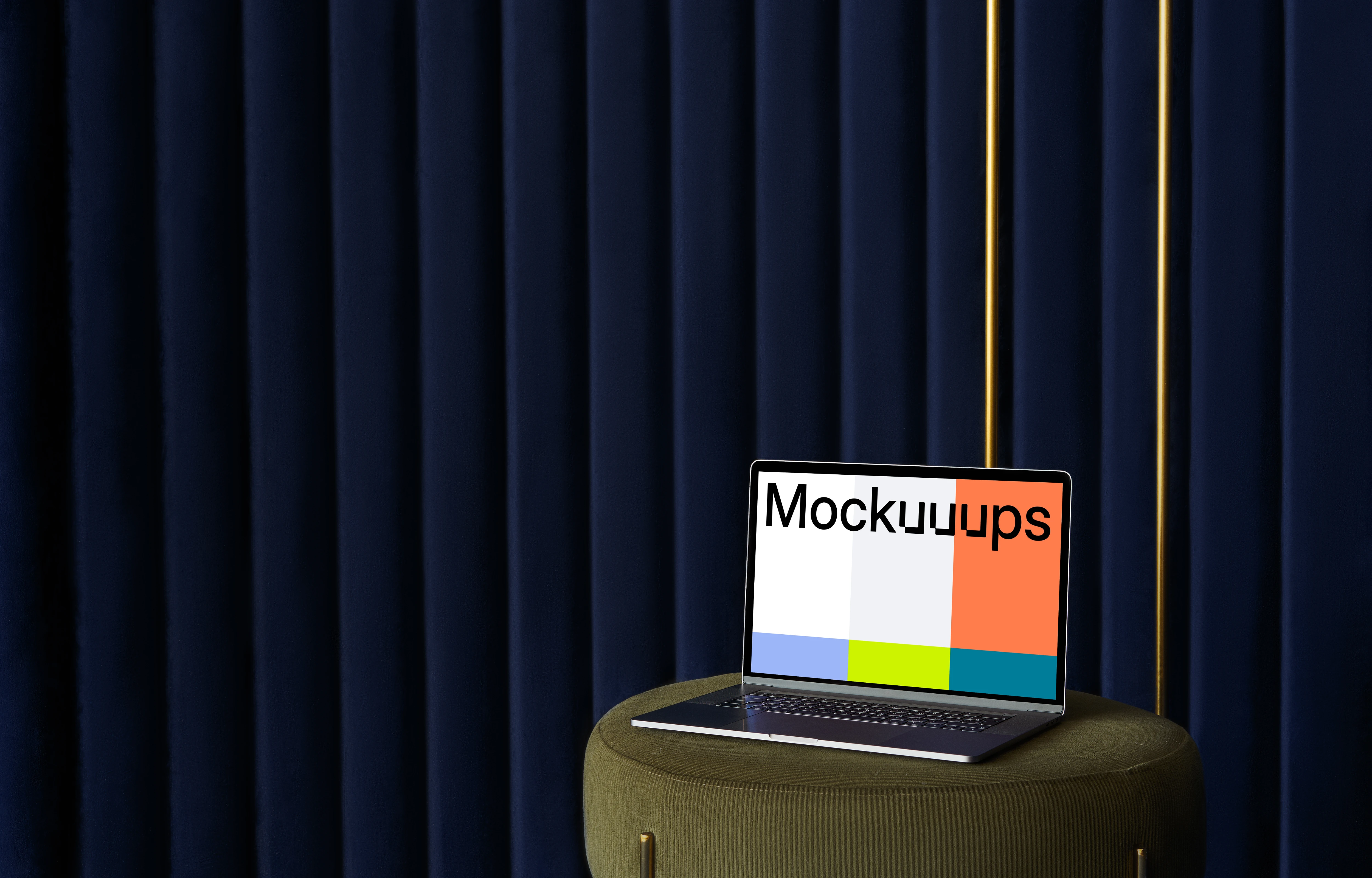 MacBook mockup on a sofa stool with a blue curtain in the background