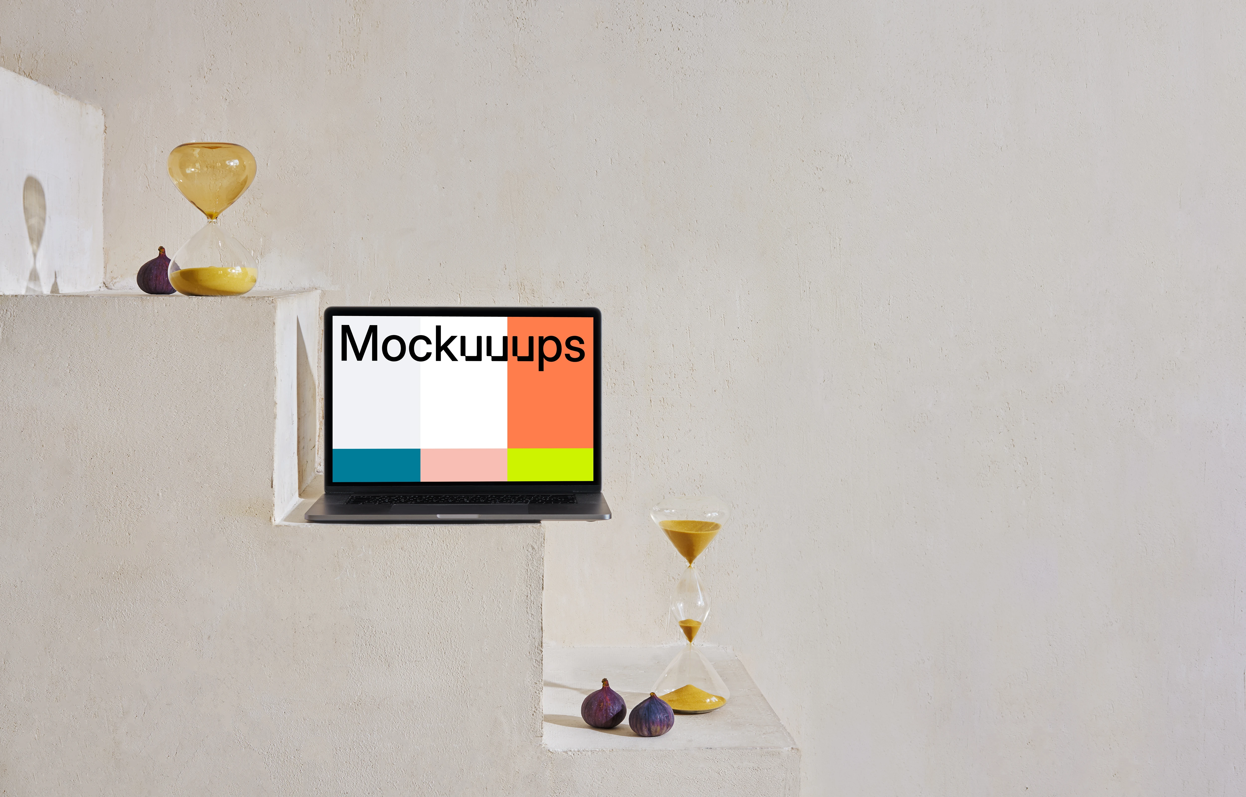 MacBook mockup on a staircase with hourglasses and onions at the side