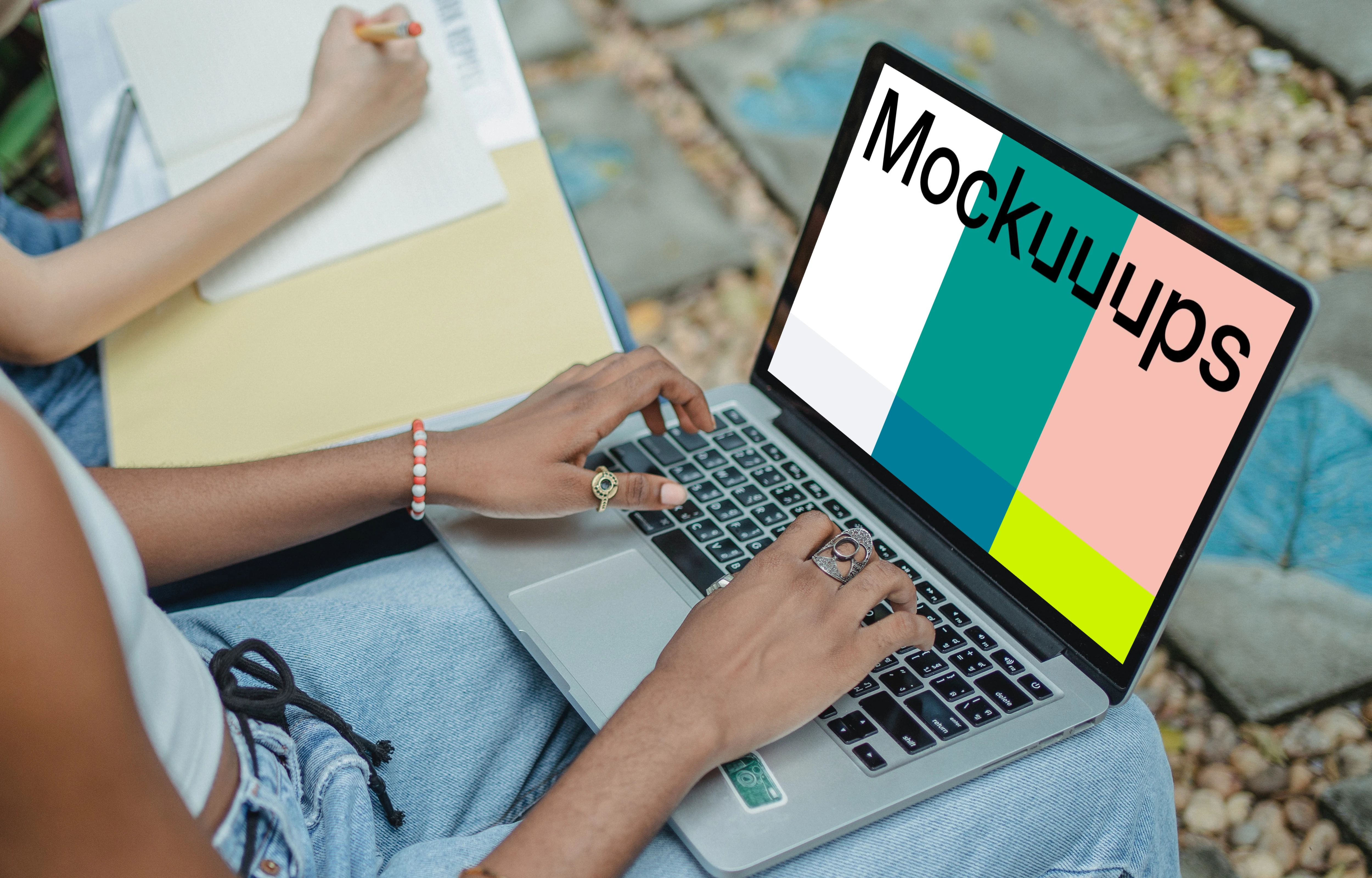 MacBook Pro mockup on a user's lap