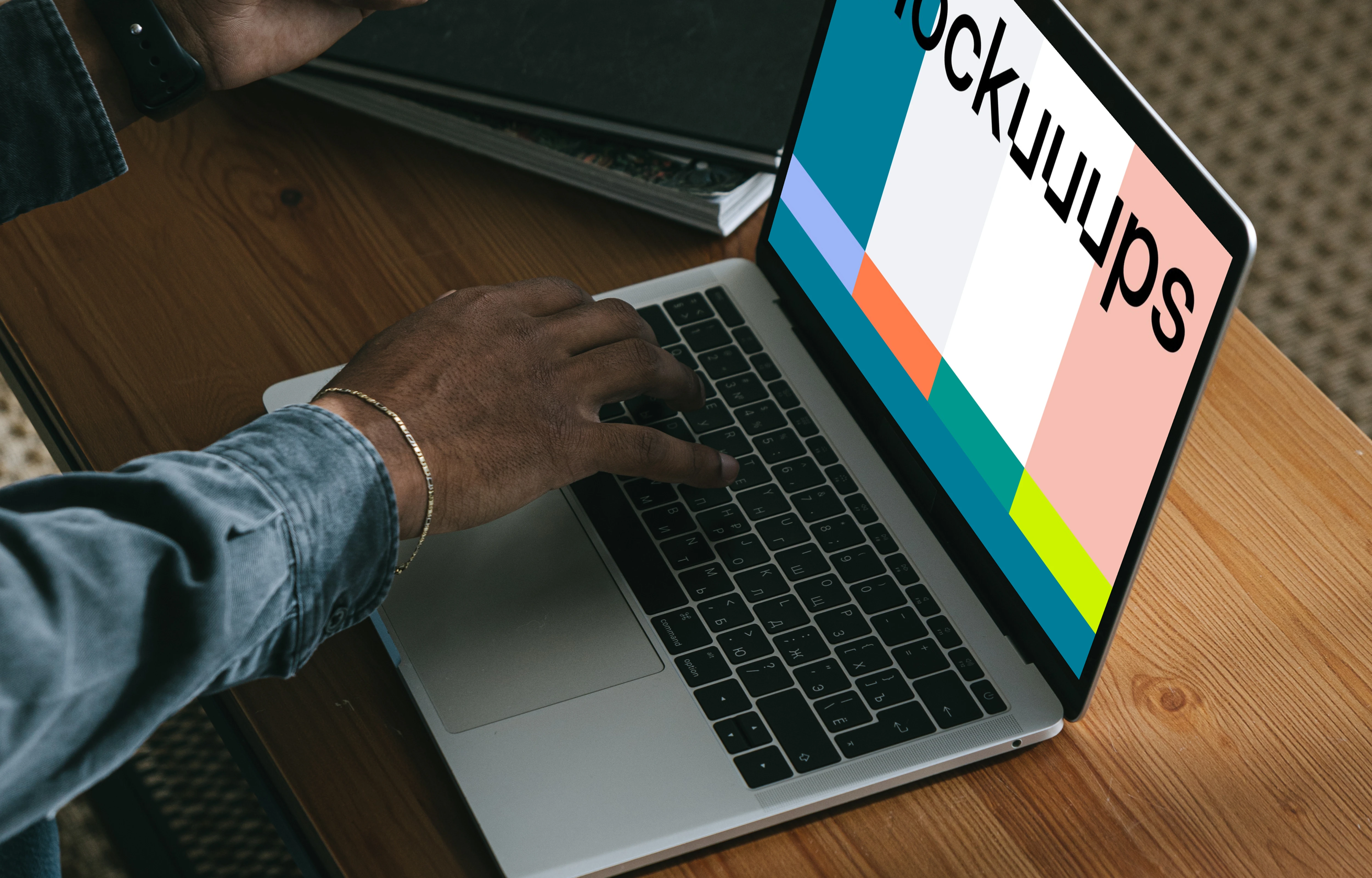 Man entering credit card details on a MacBook Pro mockup