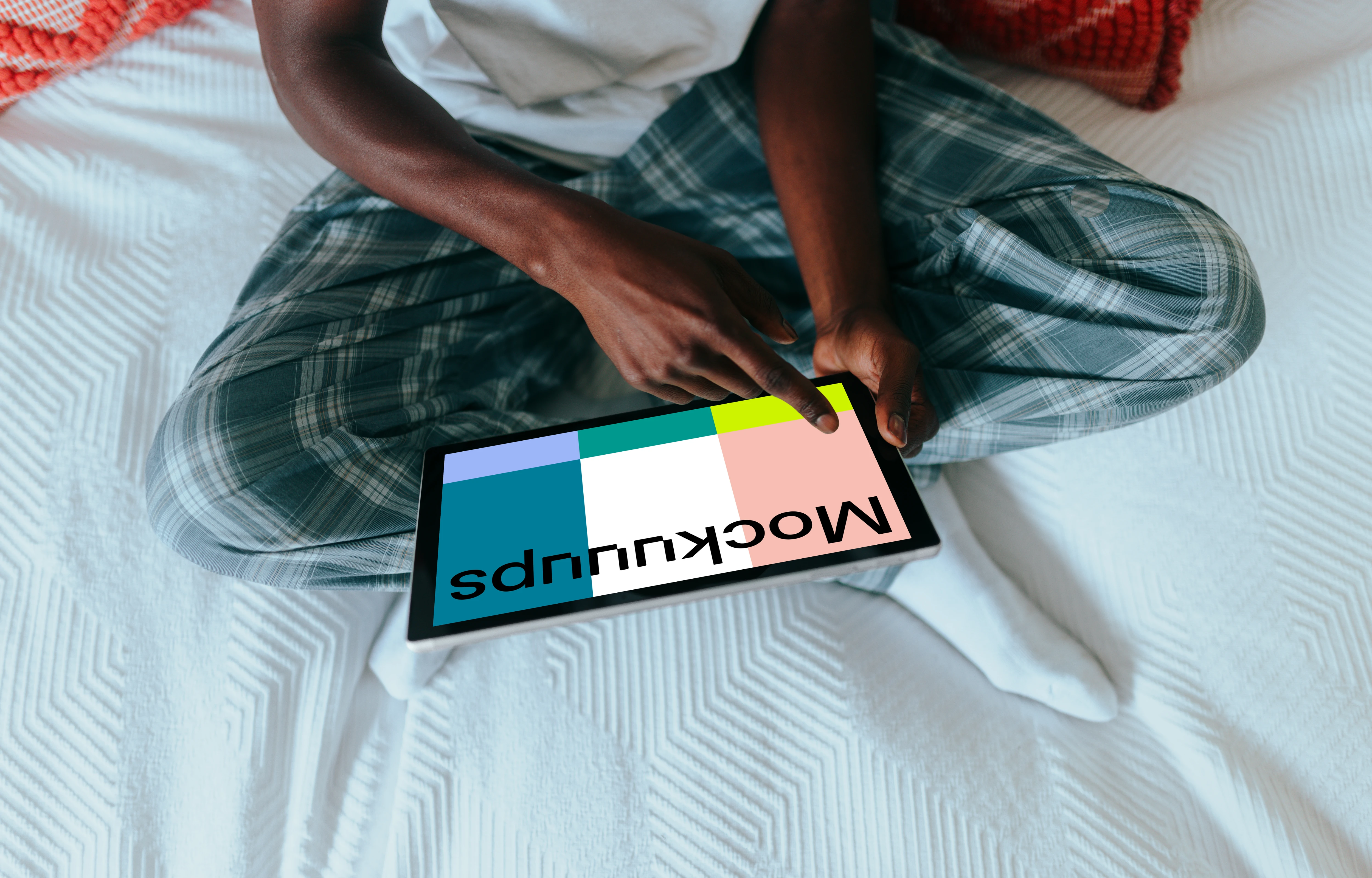 Microsoft Surface mockup held by a lady on her bed