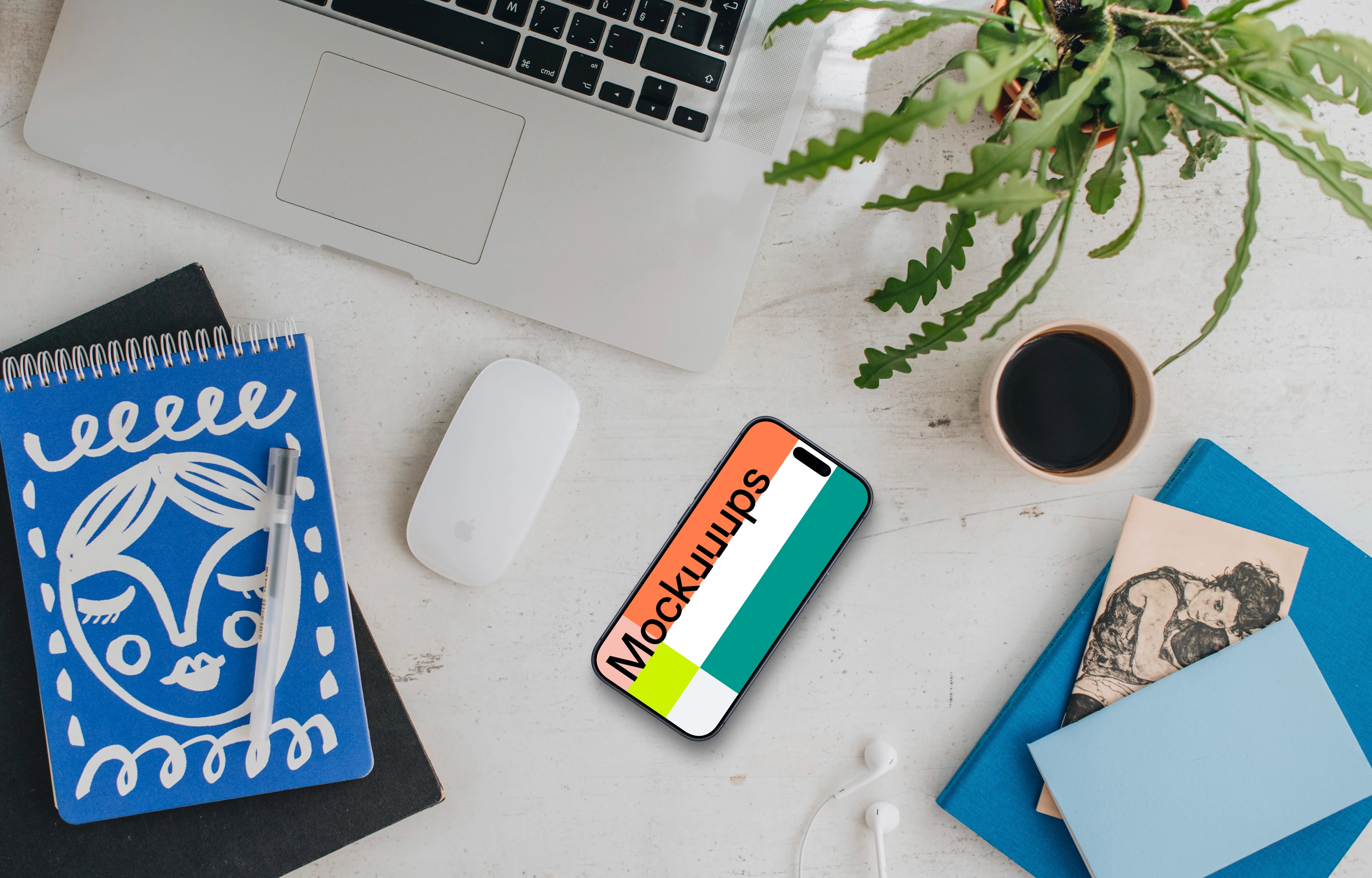 Free mockup of smartphone device with a MacBook on the side