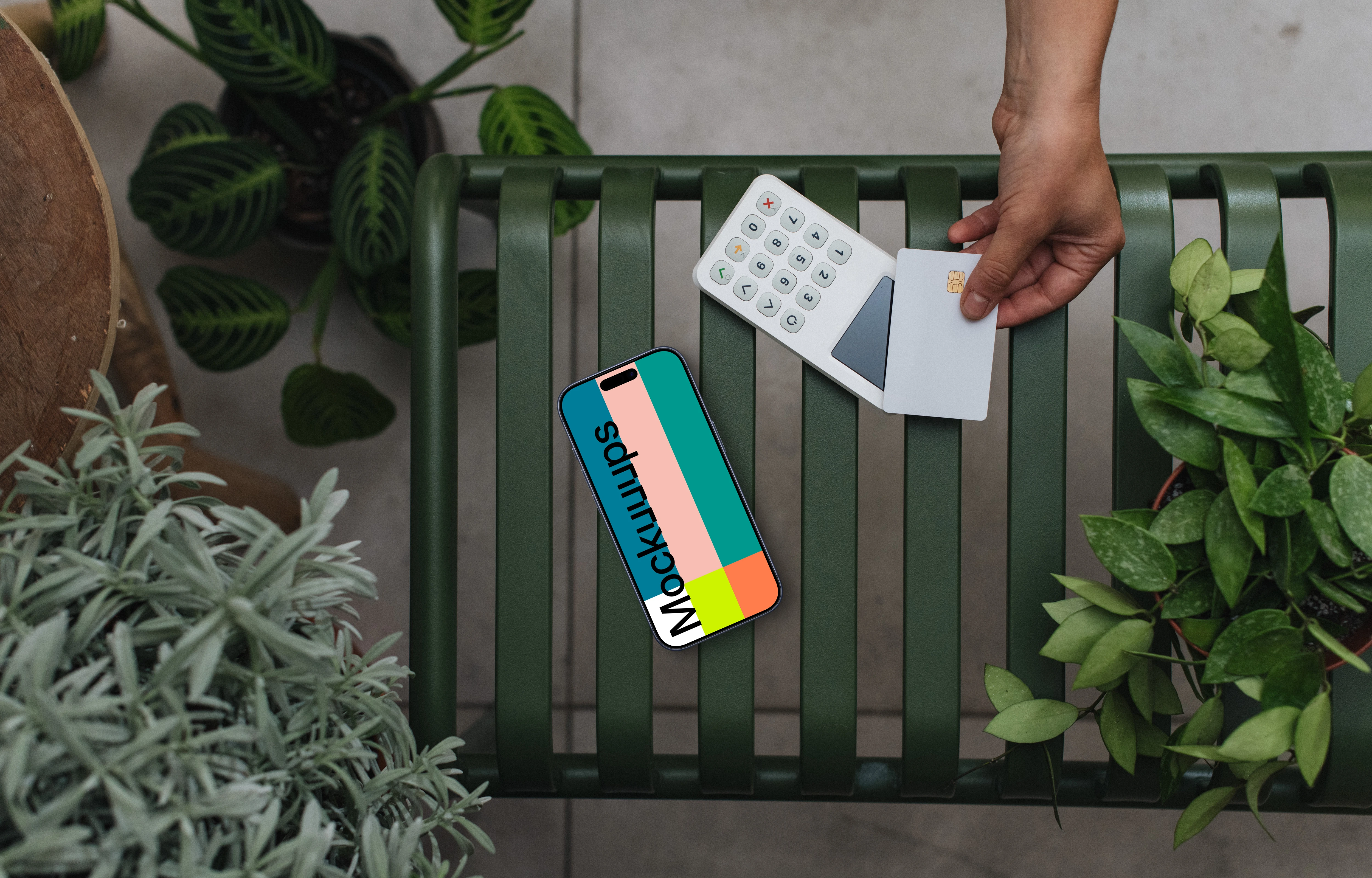 Natural oasis of plants with payment terminal and an iPhone mockup