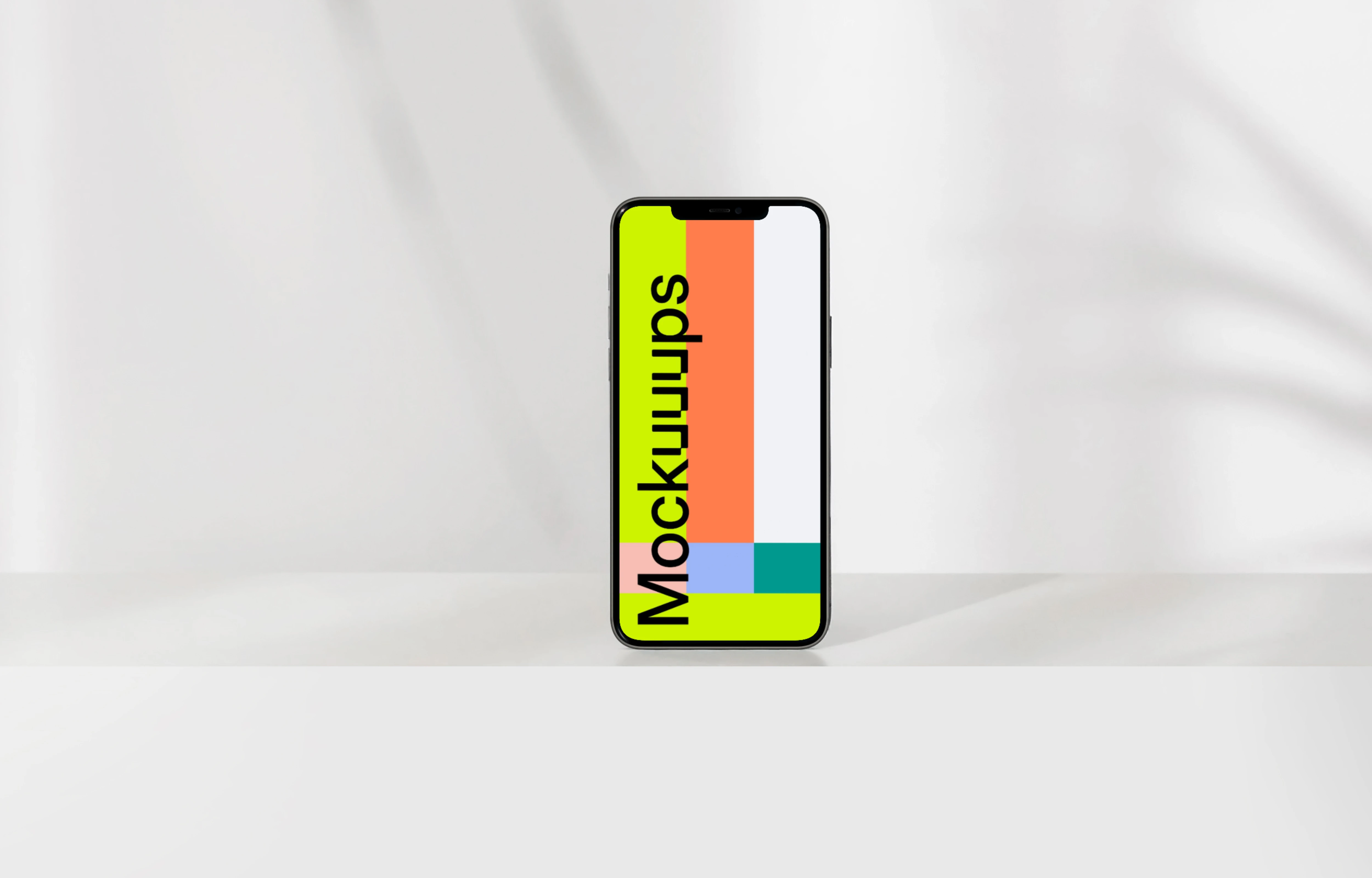 Simple iPhone mockup placed upright with a leaf in the foreground