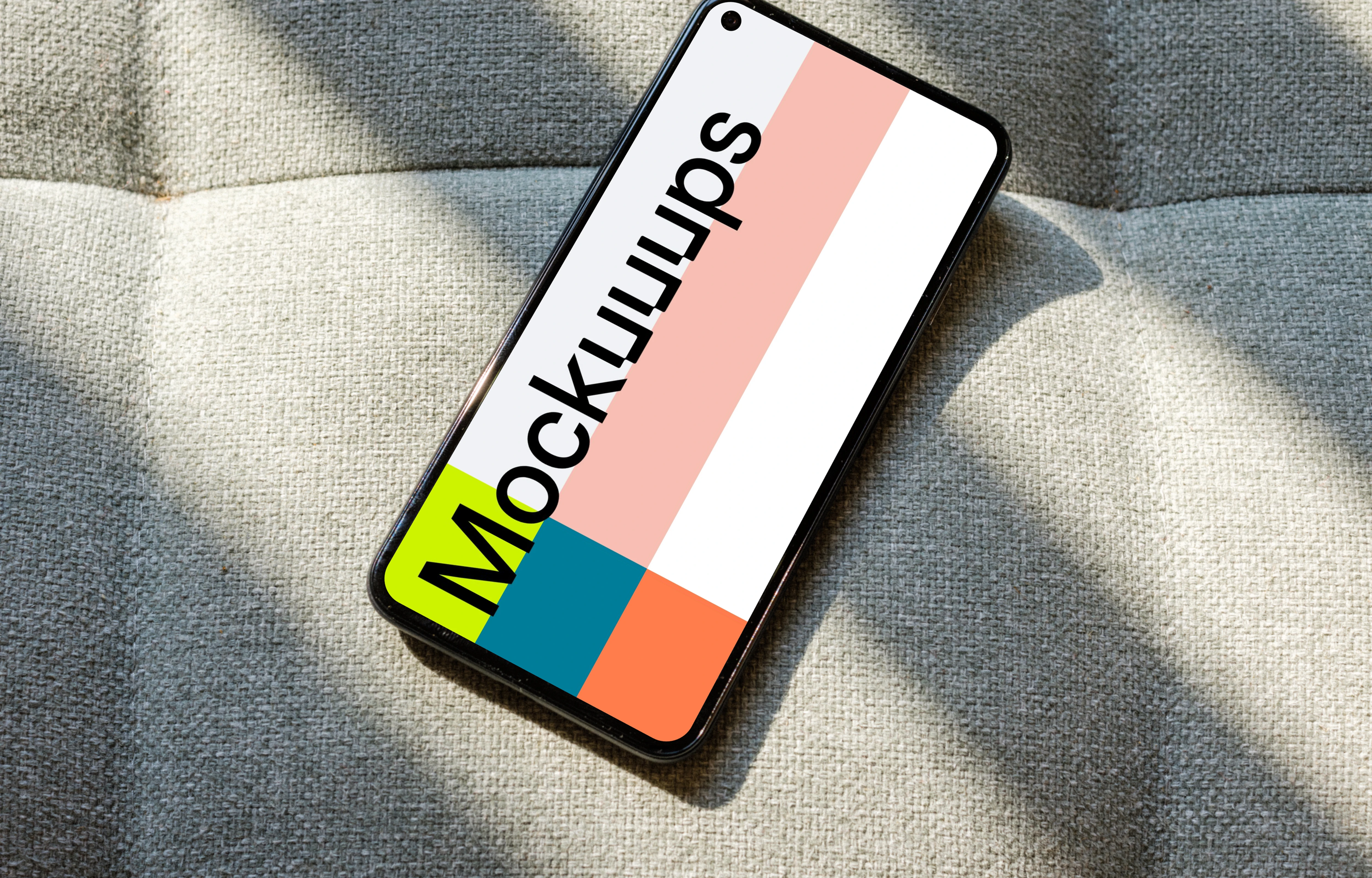 Pixel 5 mockup on a grey sofa