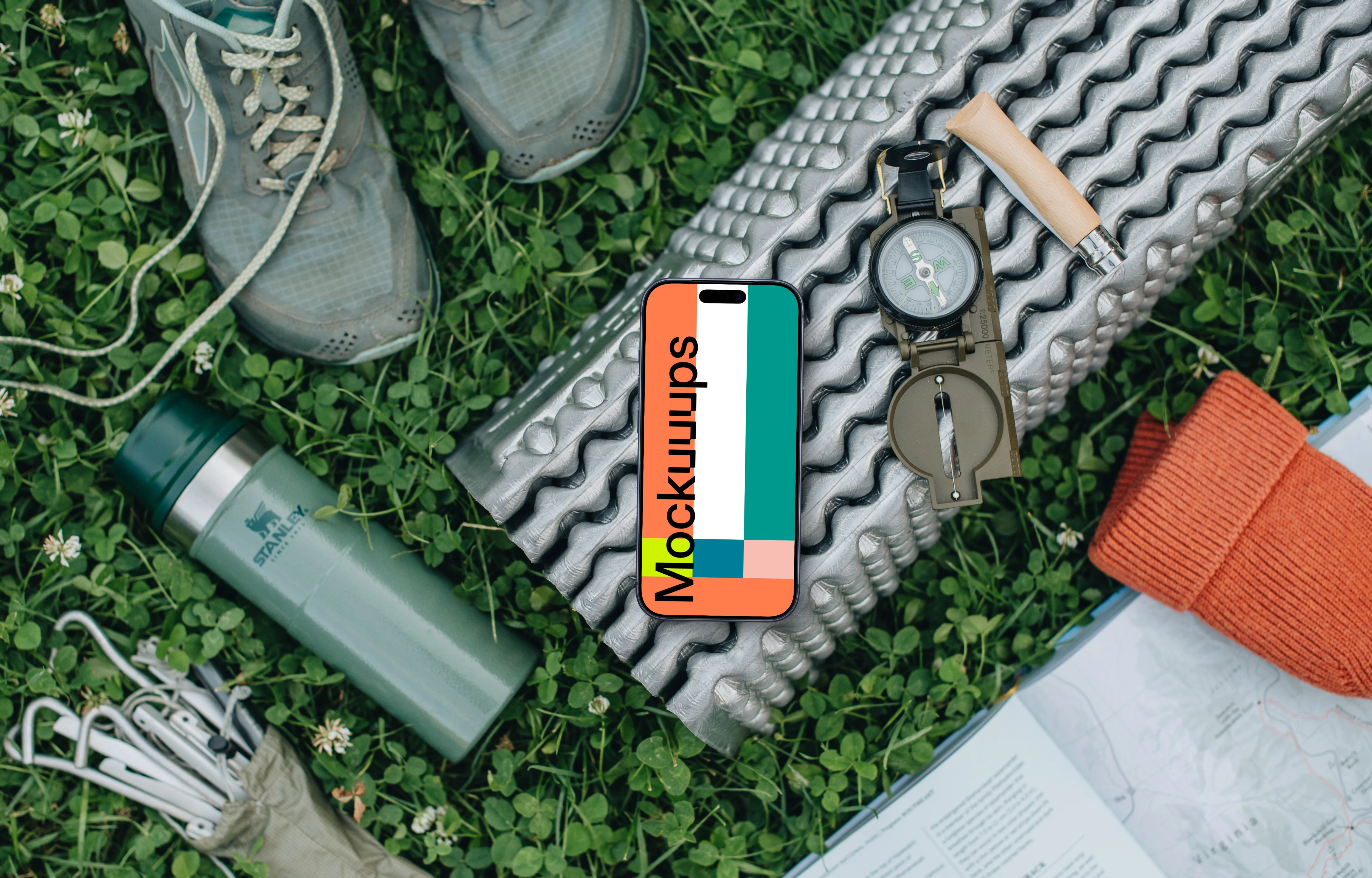 Smartphone mockup in a camp