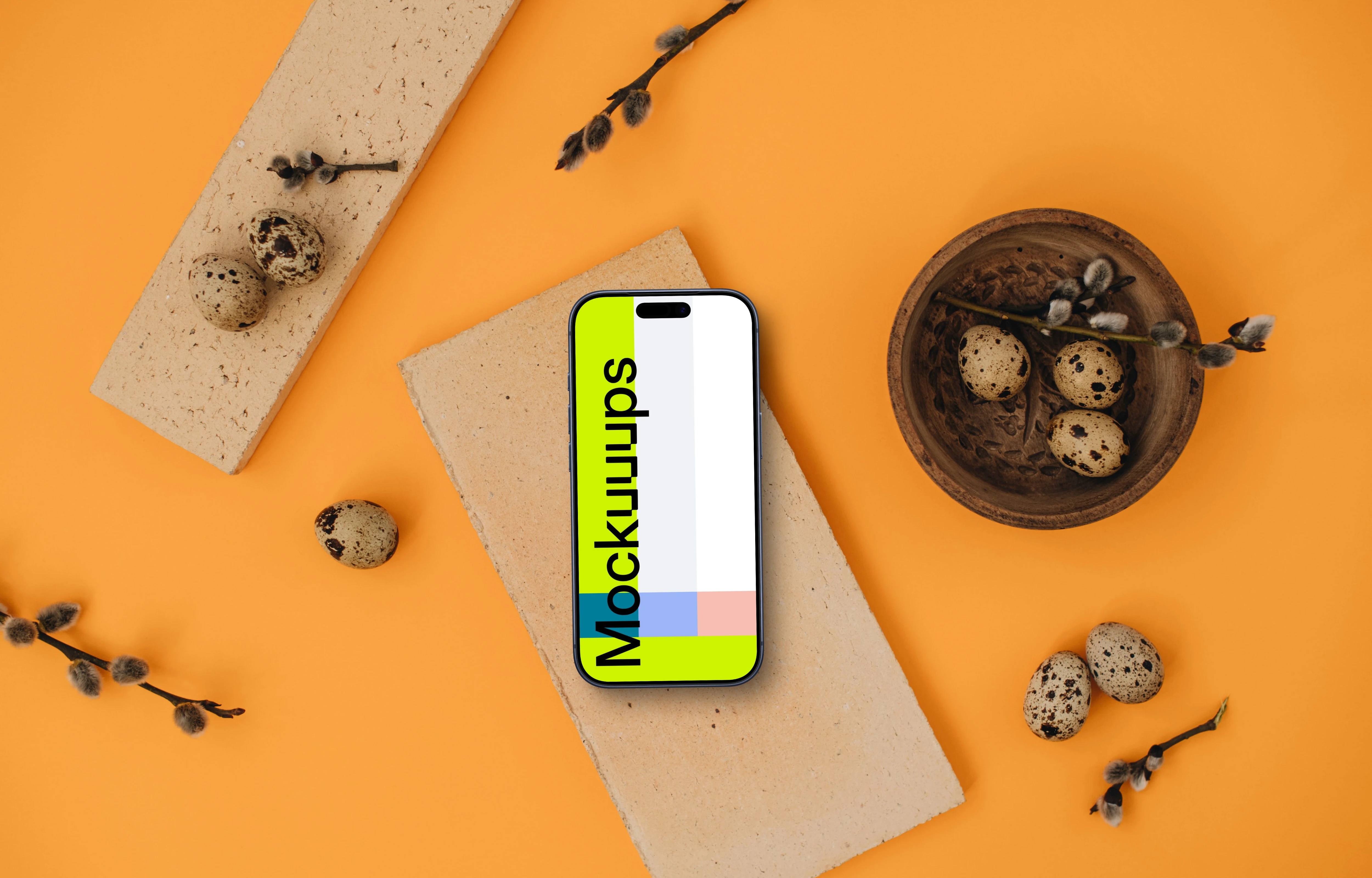 Smartphone mockup on an orange background with Easter decor
