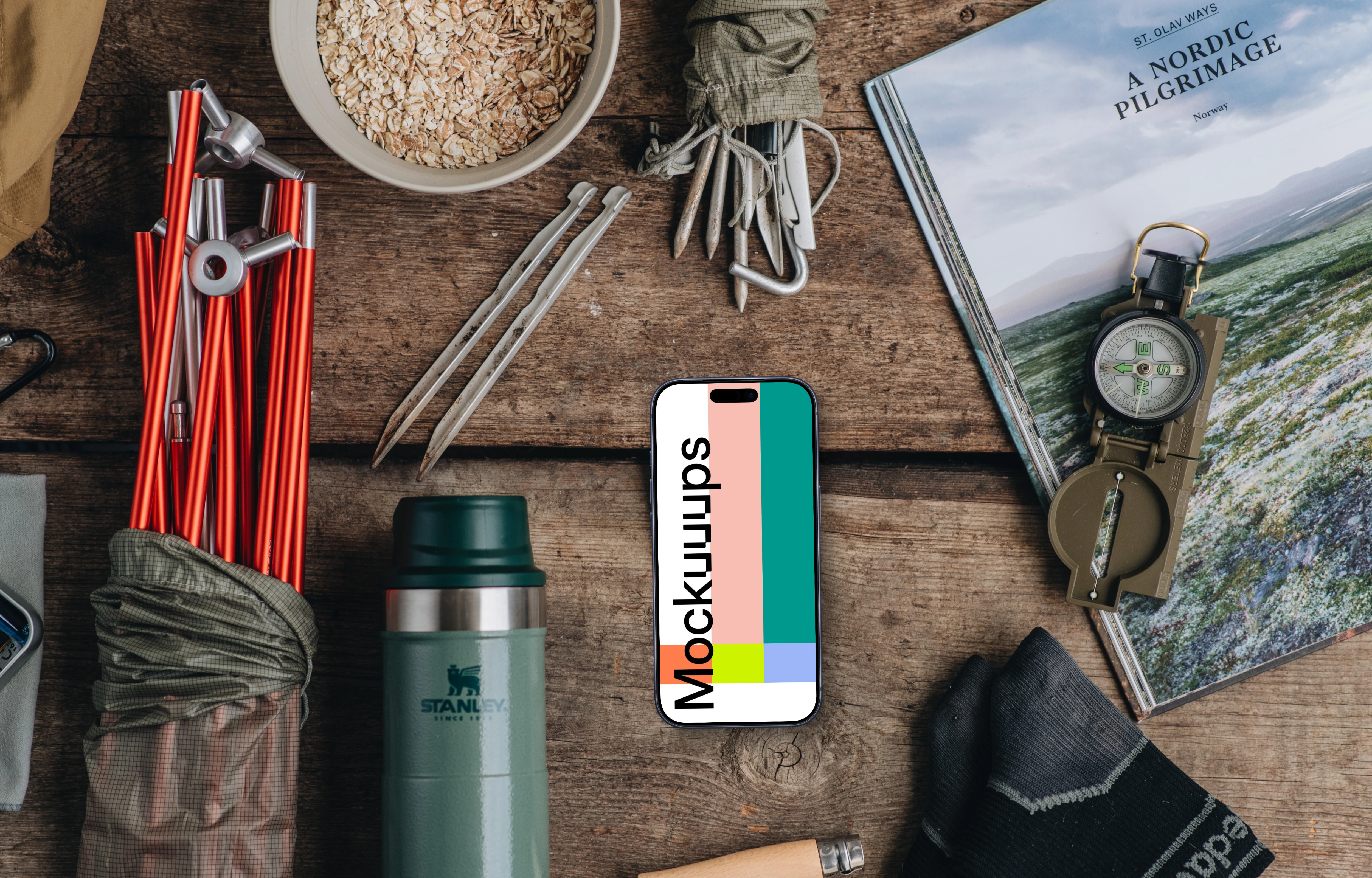 Smartphone mockup with camping supplies