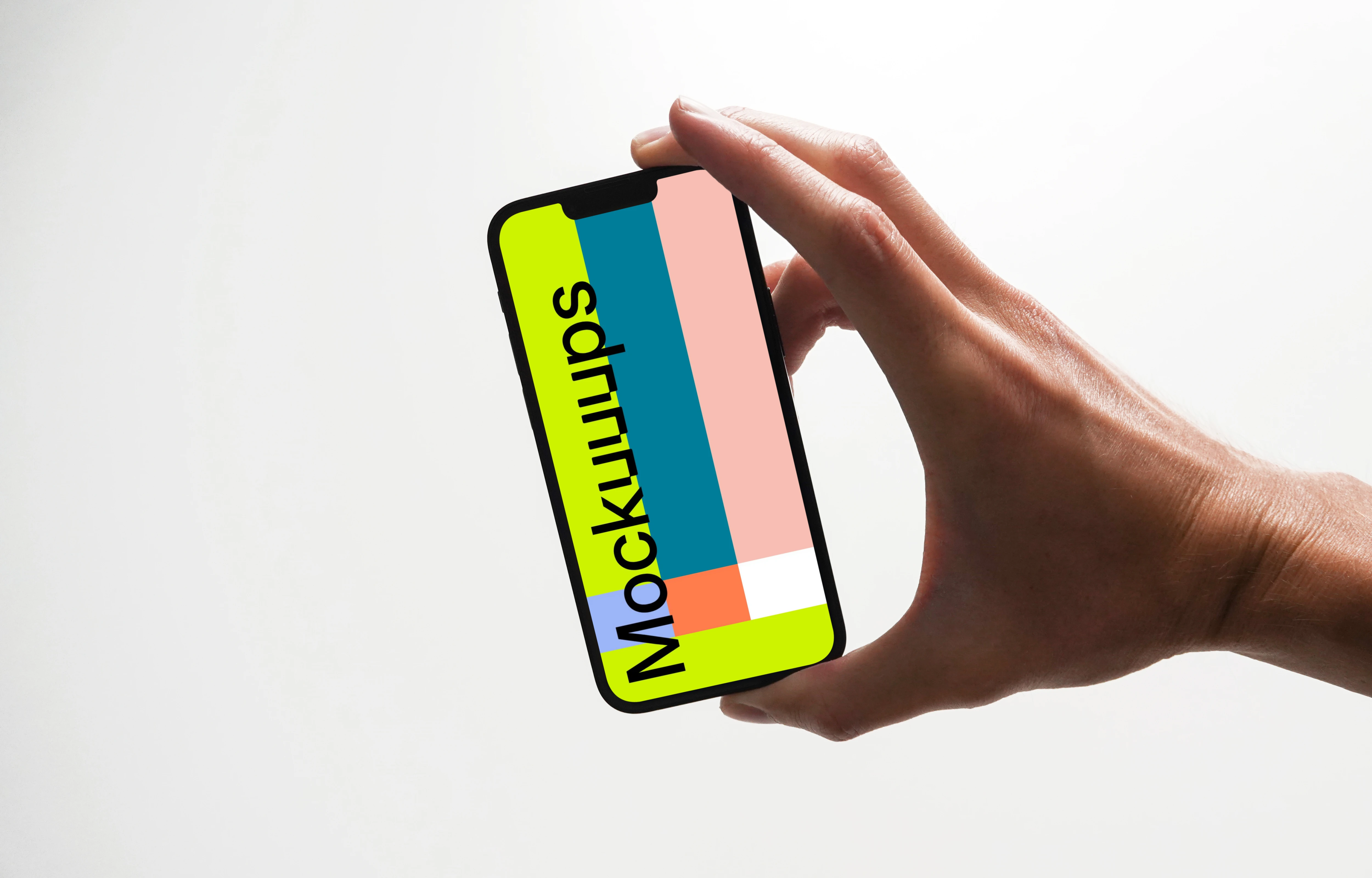 iPhone 13 mockup held up by male user