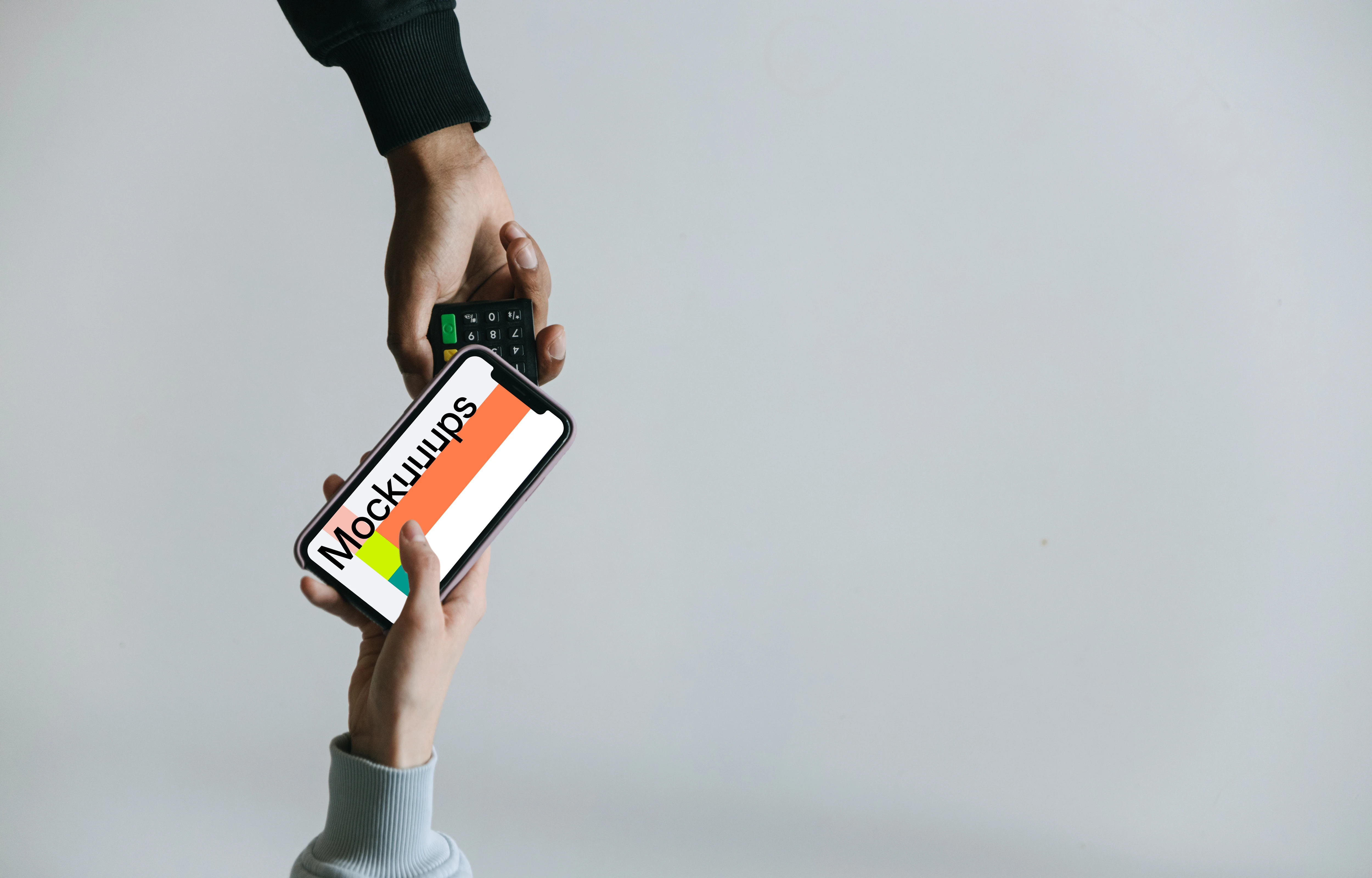 Top view of person using contactless payment with iPhone mockup