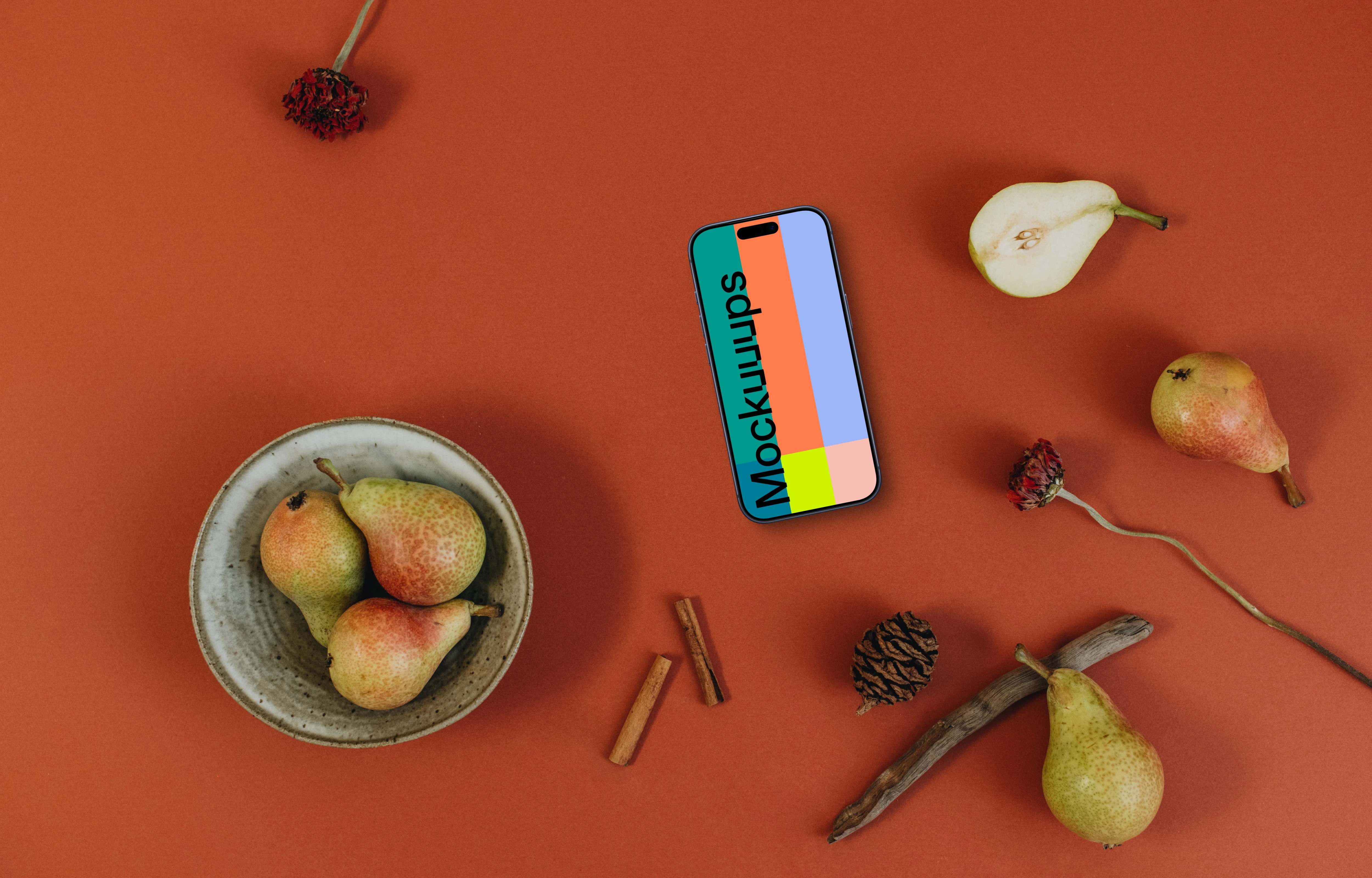 Top view of phone mockup on the dark orange background