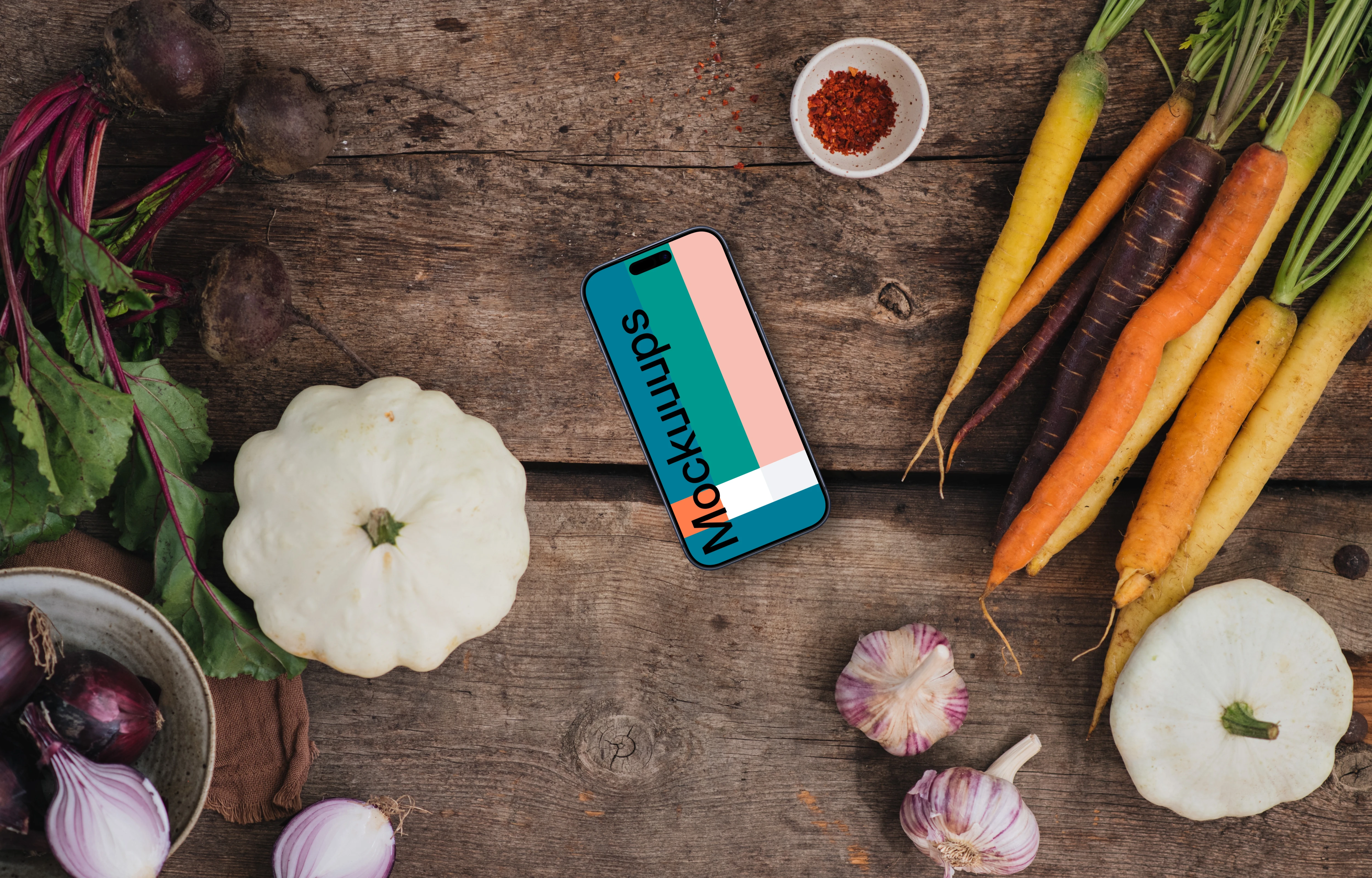 Top view of phone mockup on the wooden table