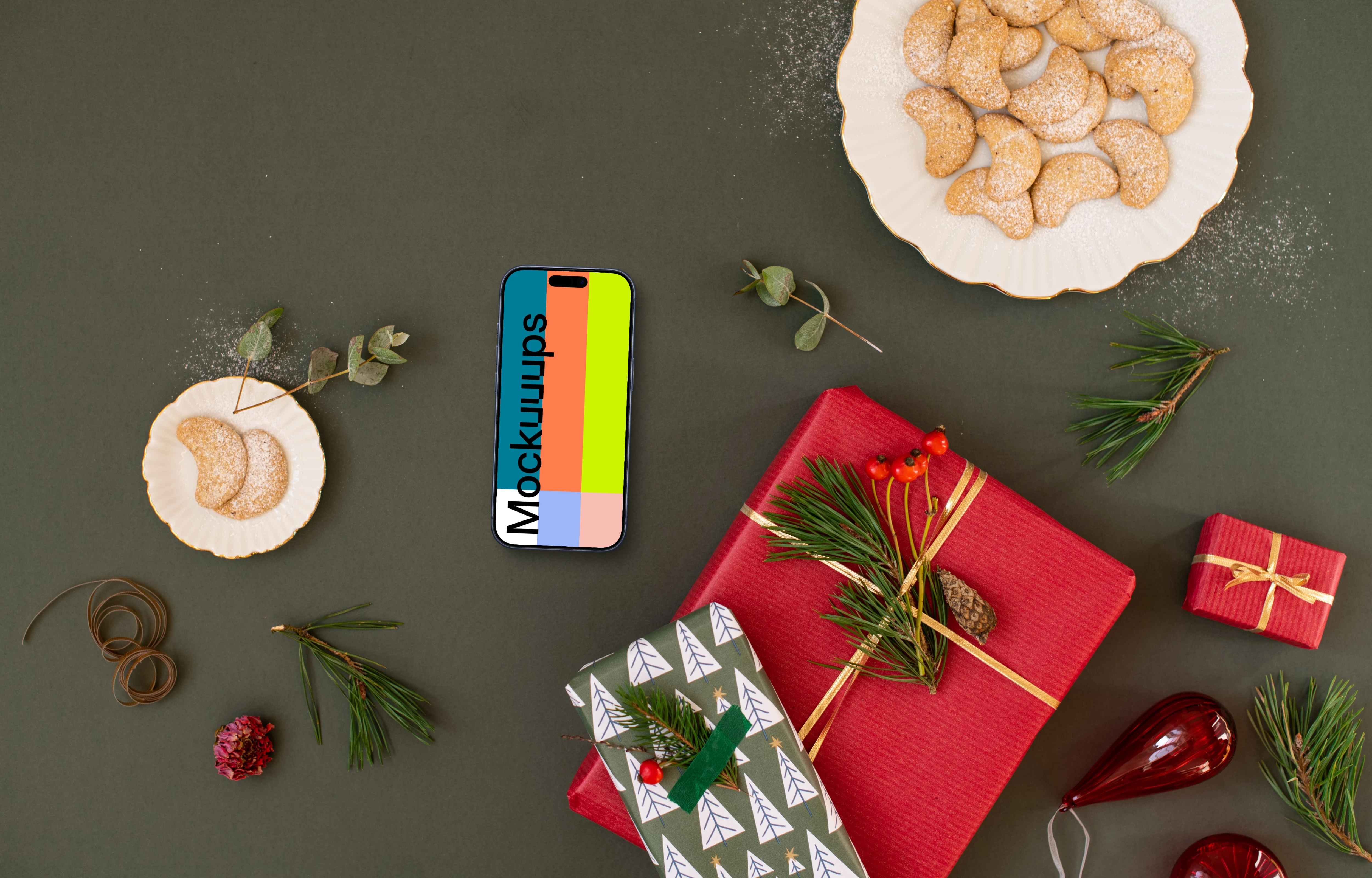 Top view of phone mockup with christmas decoration