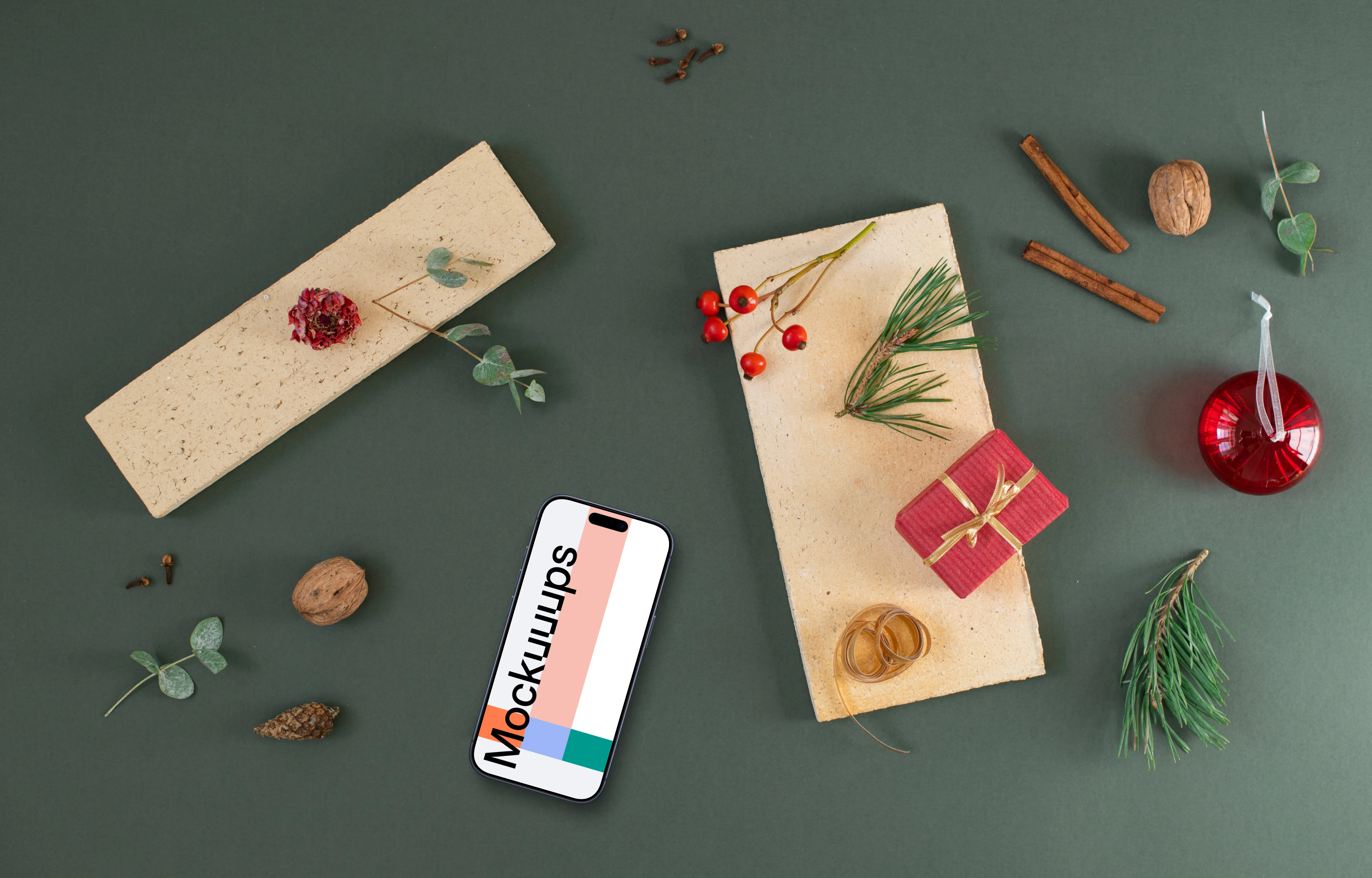 Top view of smartphone mockup with christmas decoration