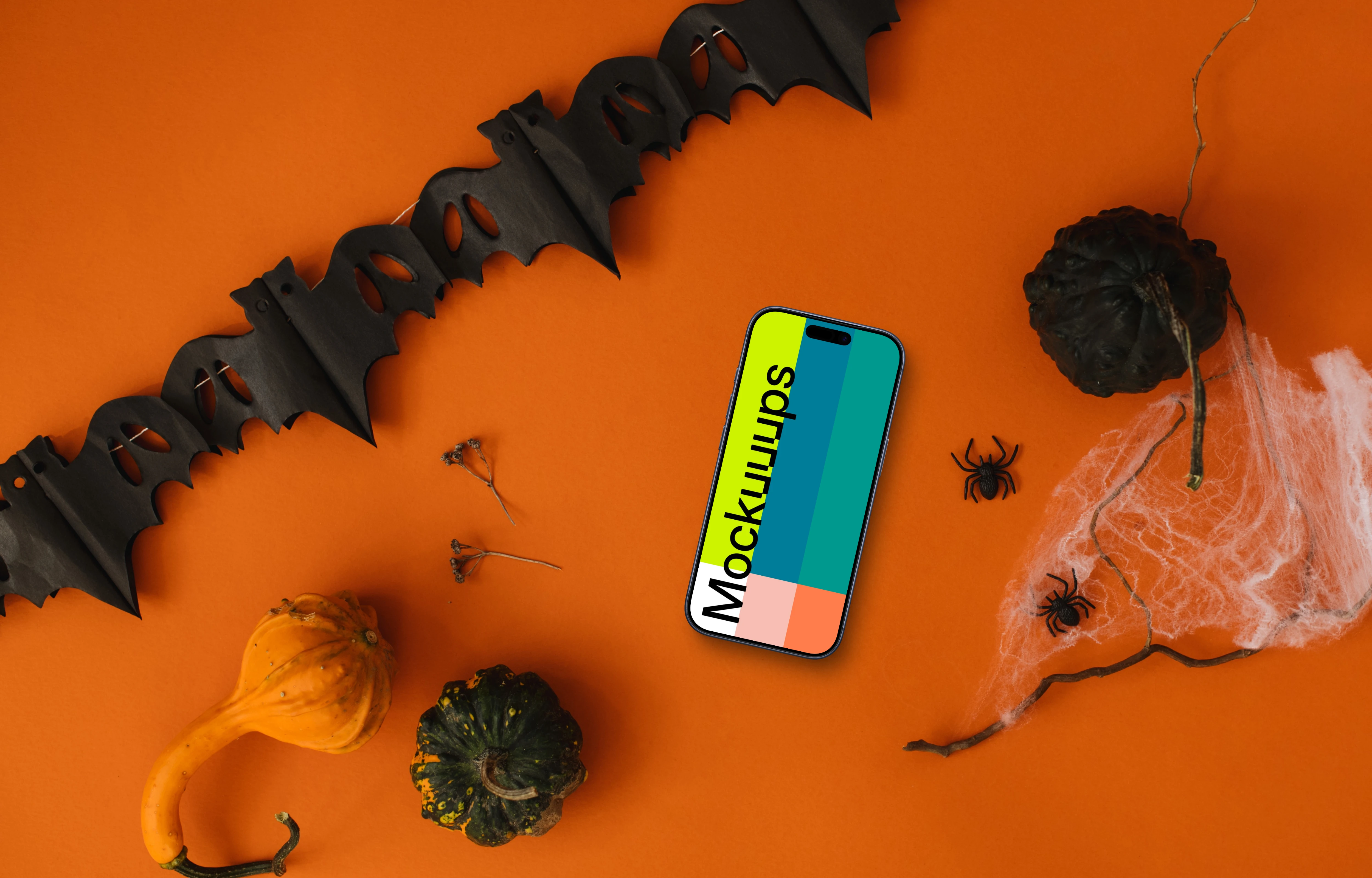 Top view phone mockup with halloween decorations