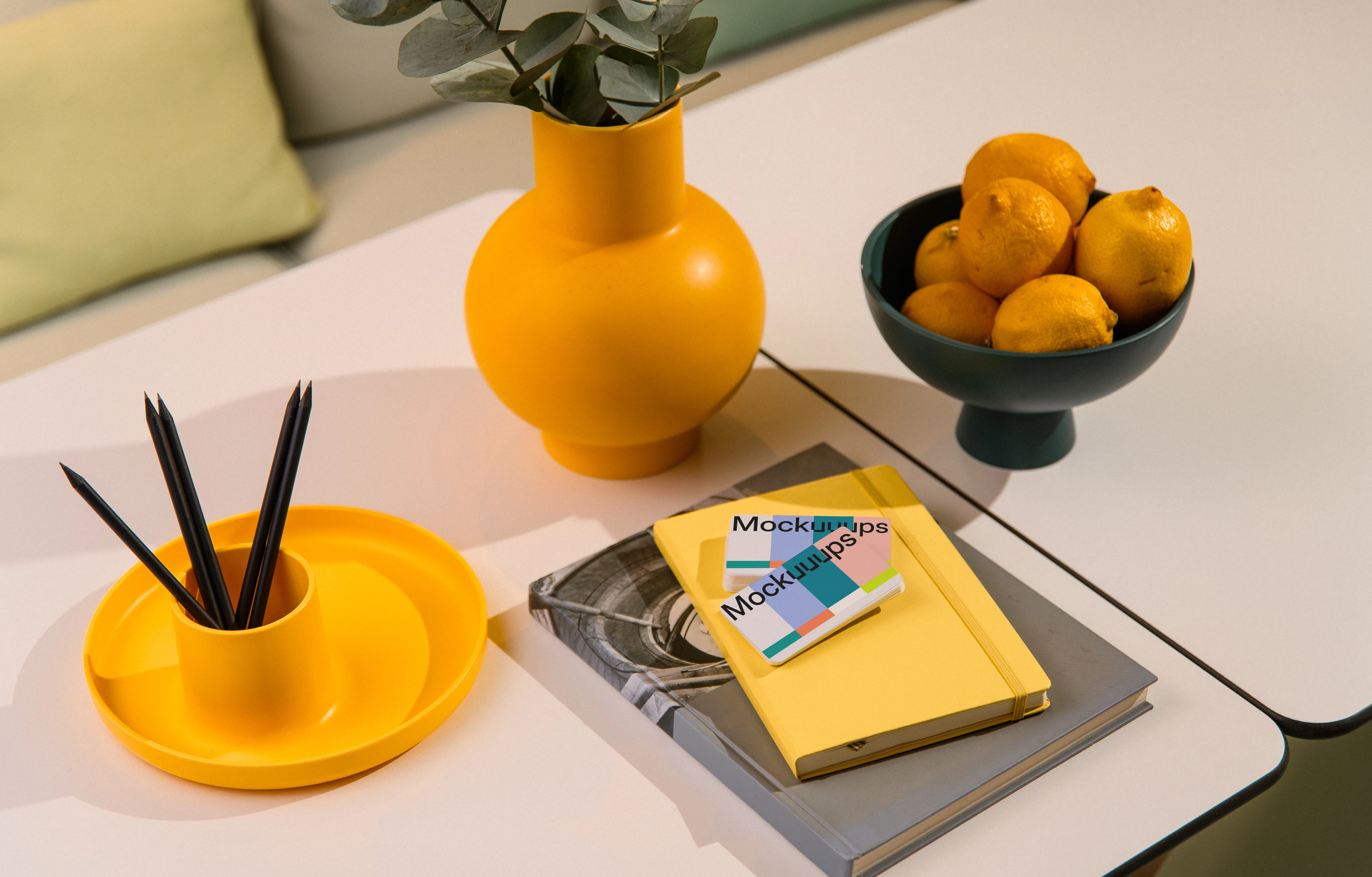 Two business cards mockup on a modern tabletop scene