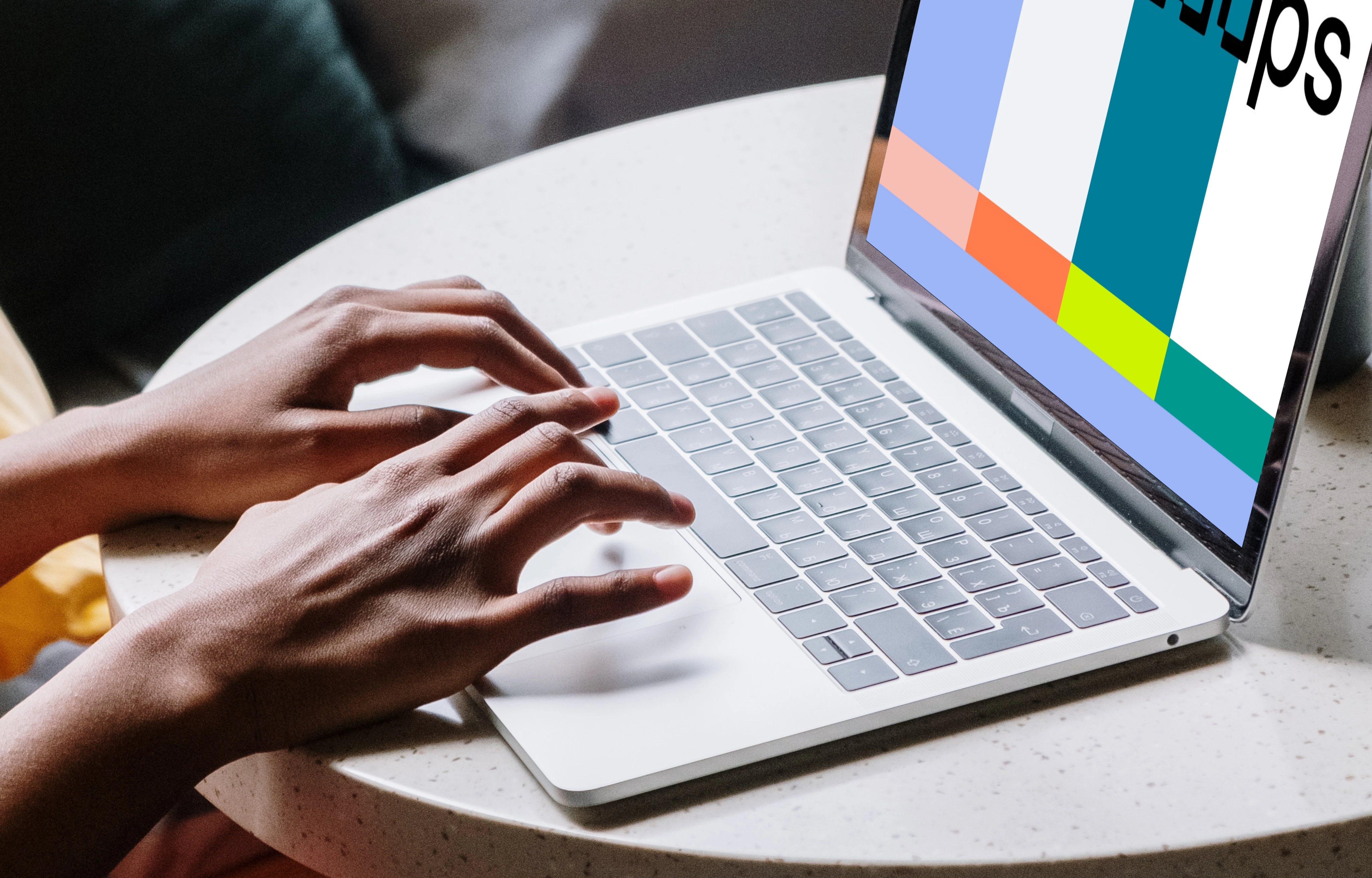 White MacBook Pro mockup on table