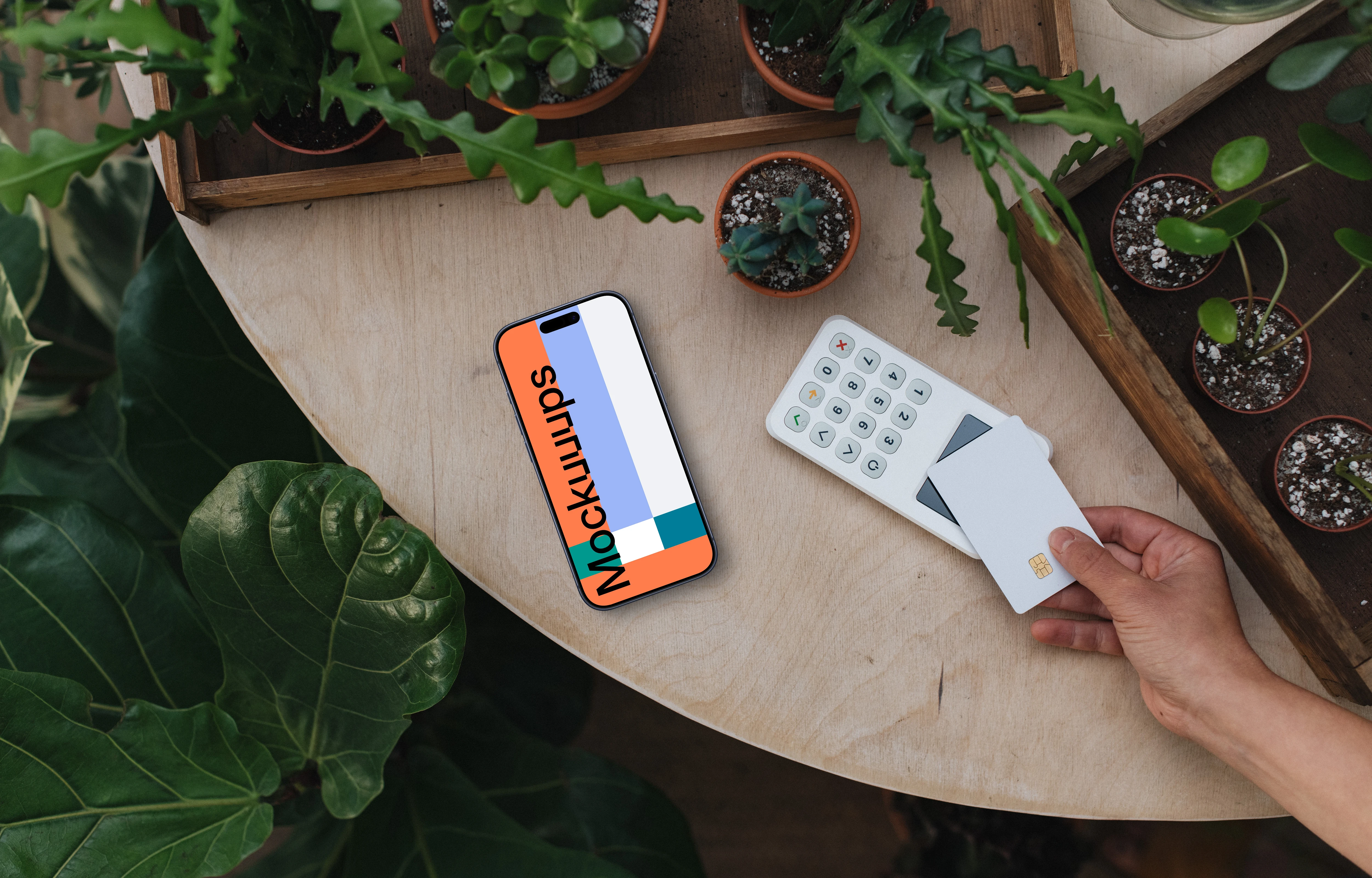 Person paying, botanical surrounding and an iPhone mockup
