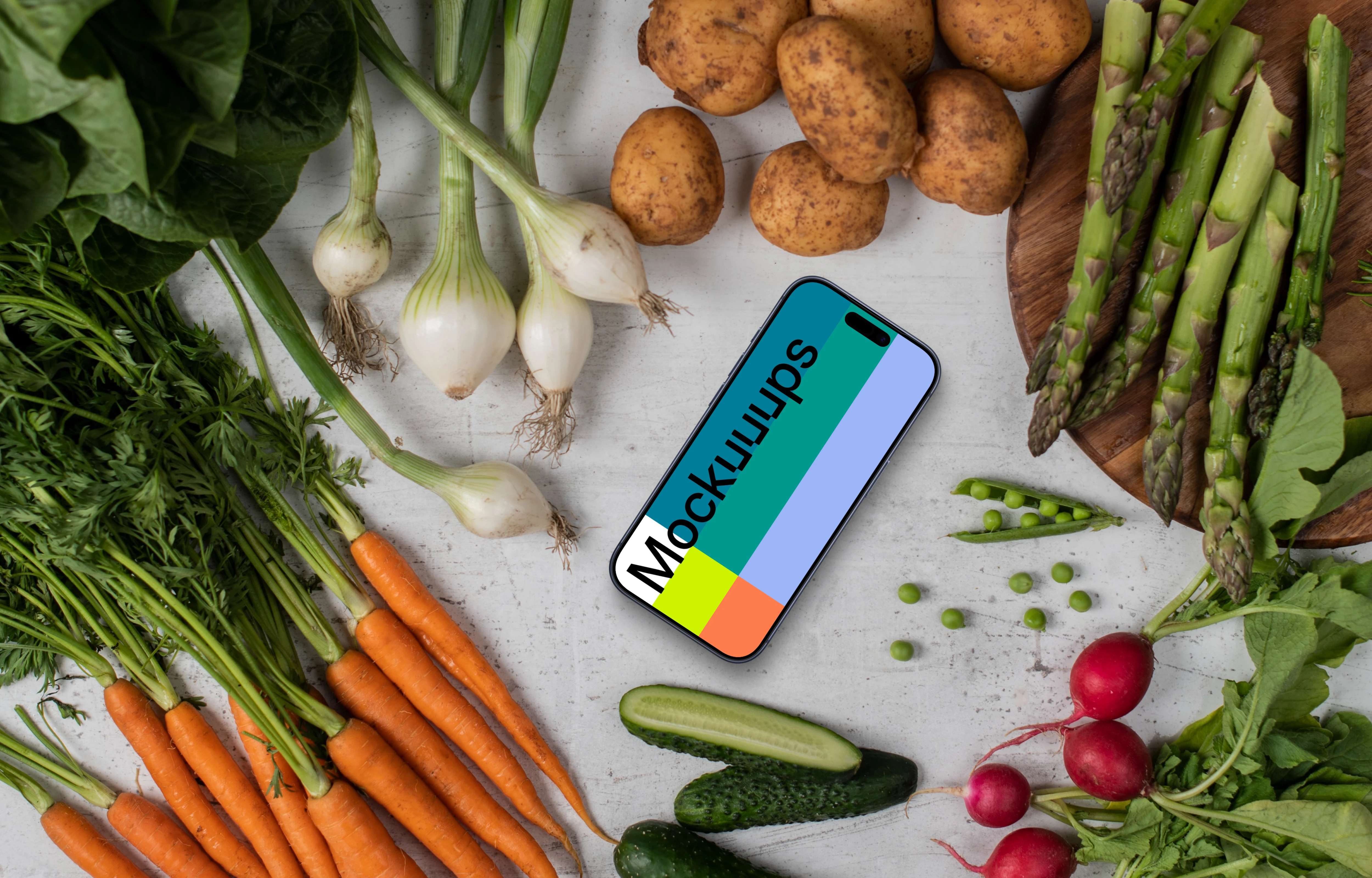 Smartphone mockup surrounded by vegetables