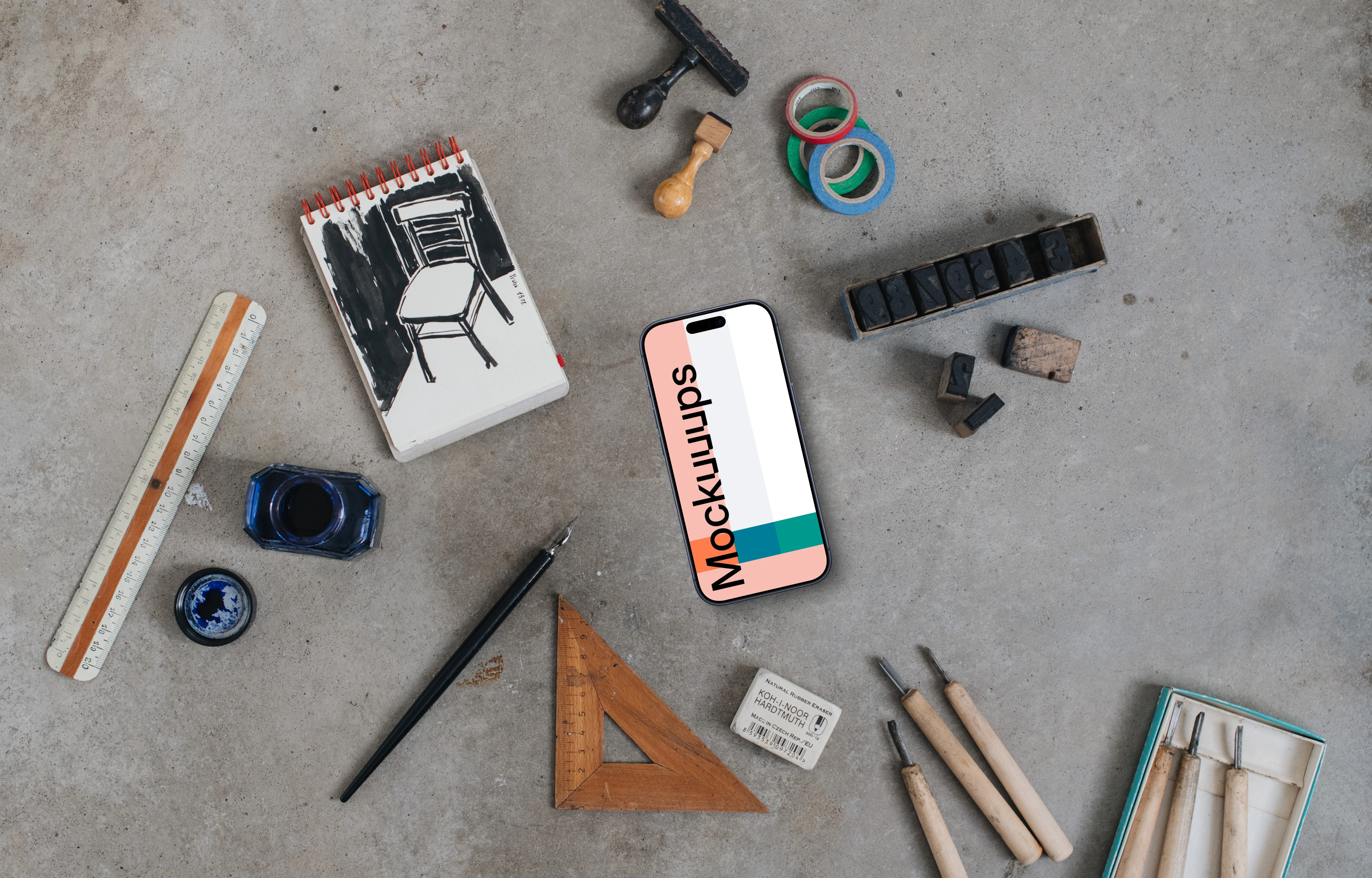 Smartphone mockup with a brush and ink on the side