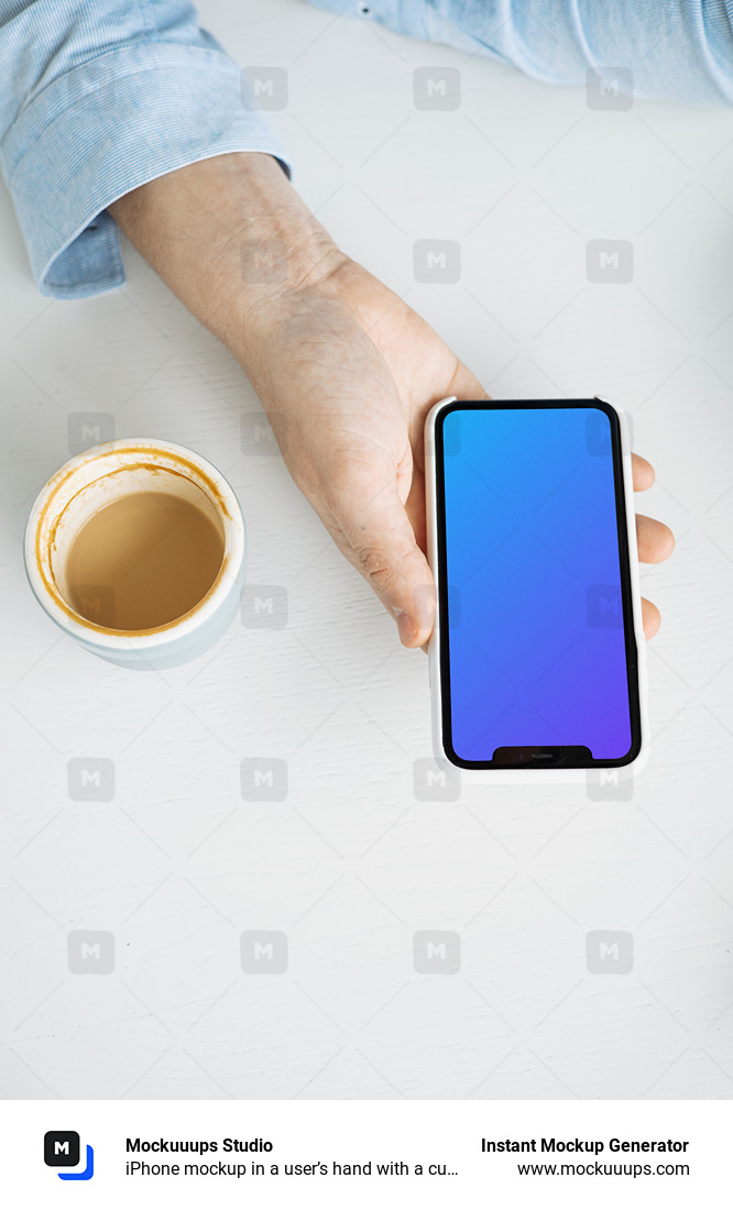 iPhone mockup in a user’s hand with a cup of coffee at the side