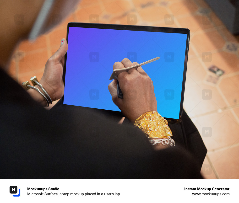 Microsoft Surface laptop mockup placed in a user’s lap